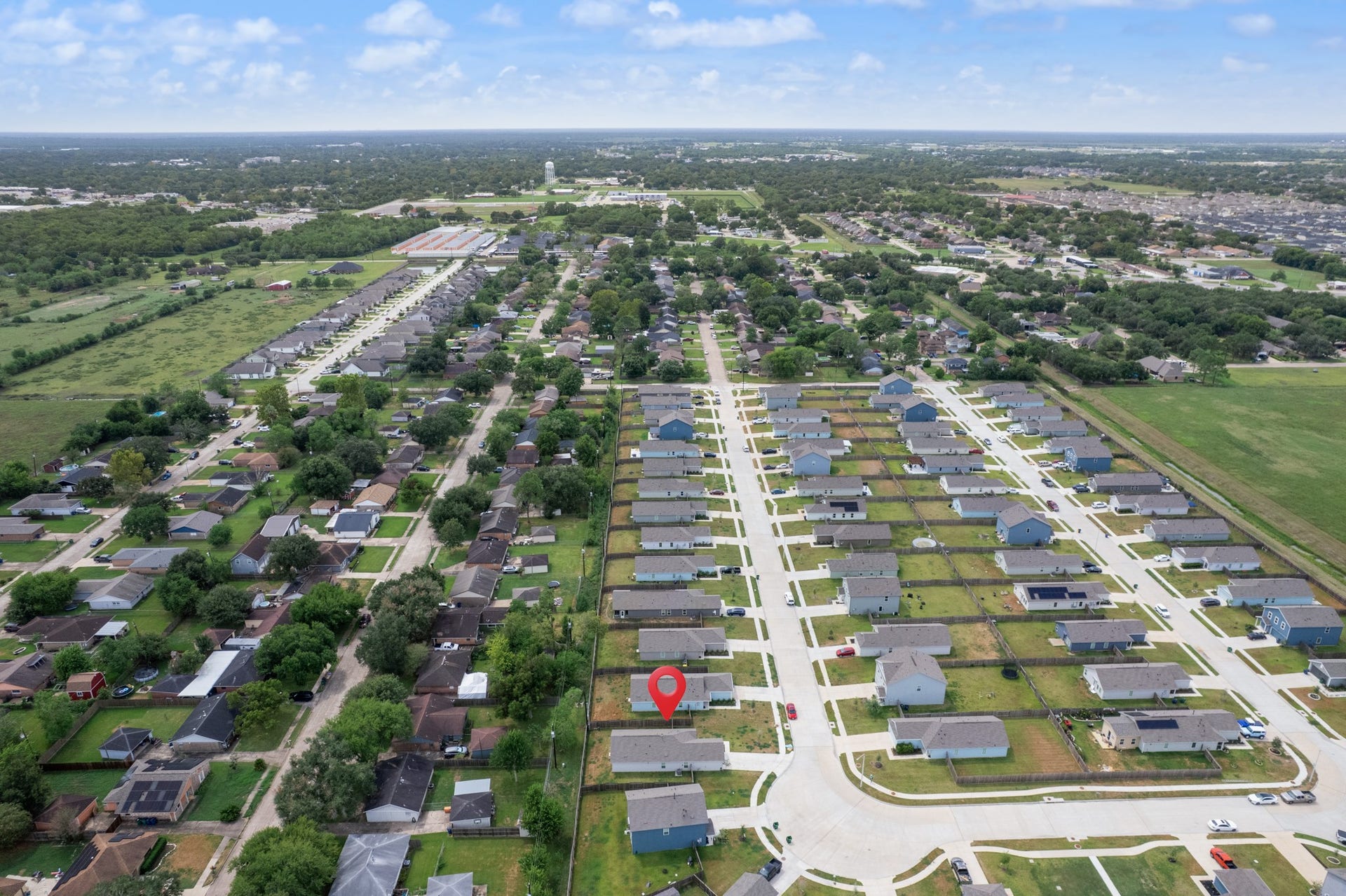 Broad neighborhood perspective provides a clear look at the homes location and the surrounding residential area.