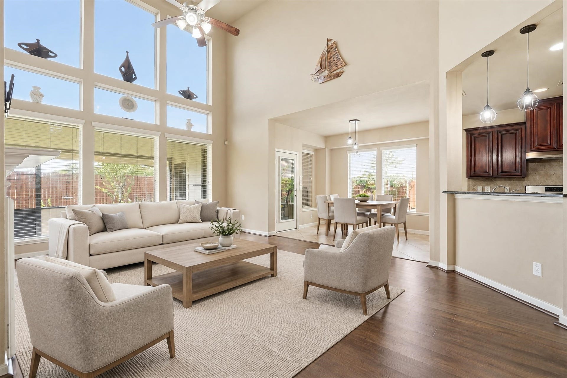 5106 Autumn Rose Lane, Sugar Land, TX 77479 Virtually staged. An open layout connects the living room, breakfast area and kitchen, so conversation and movie nights flow easily from one space to the next.
