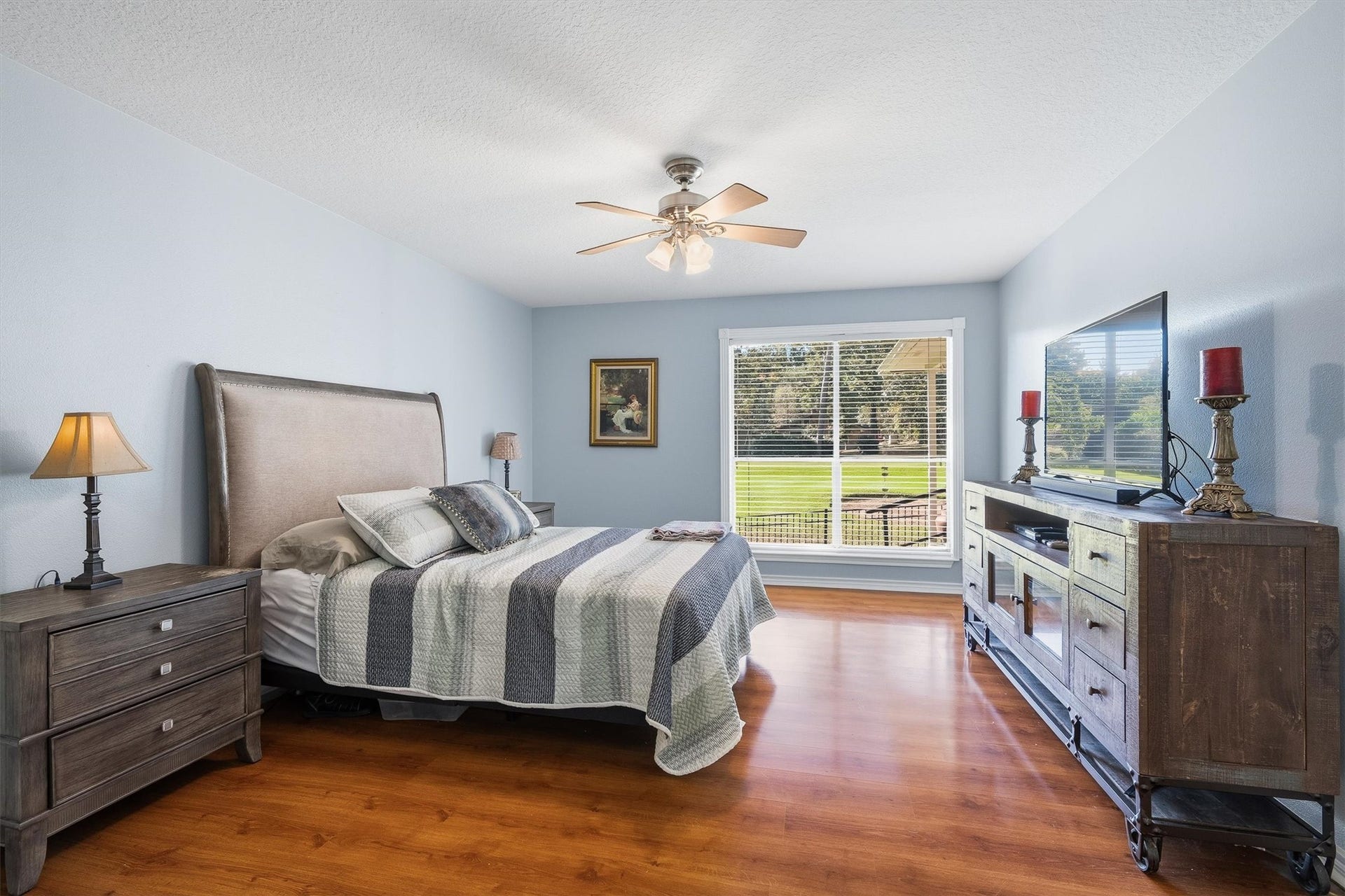 149 Thunderbird Drive, Conroe, TX 77304 Tucked away on its own side of the home, the primary bedroom wakes up to a fairway view right outside the window.