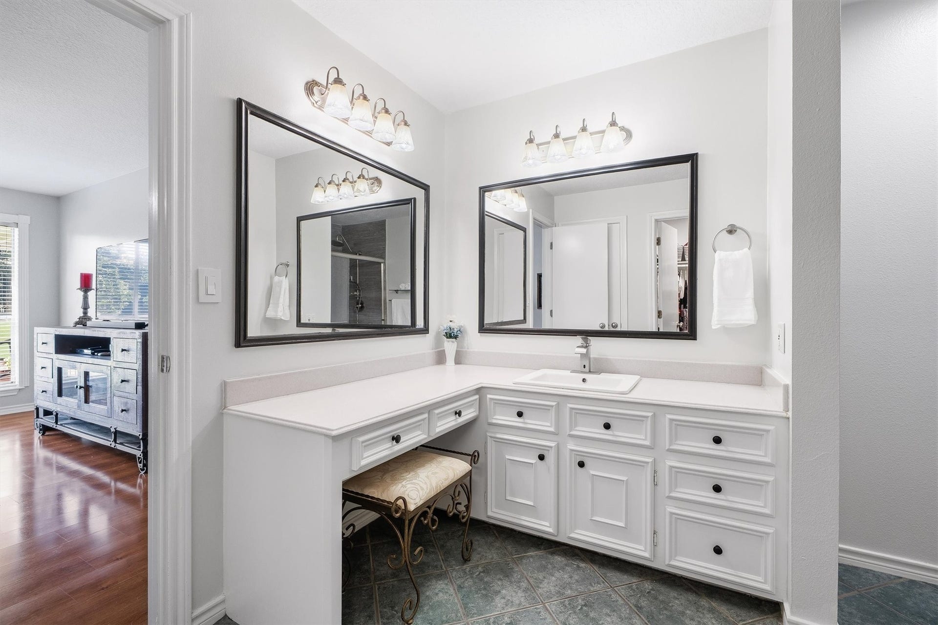 149 Thunderbird Drive, Conroe, TX 77304 A built-in seated vanity gives you a dedicated spot to get ready, with plenty of drawer space for everything that usually crowds the counter.