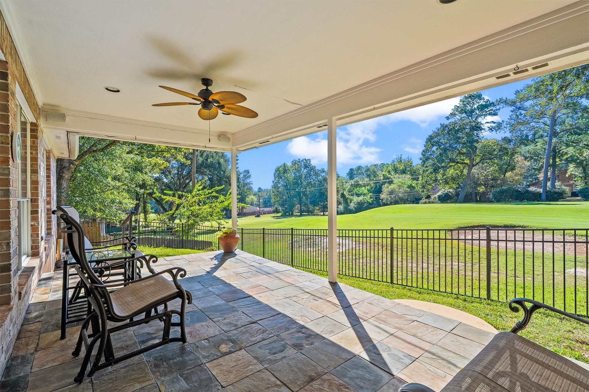 149 Thunderbird Drive, Conroe, TX 77304 THIS is the reason youll want to live at 149 Thunderbird. Panorama Village is built around one golf course, and this home claims a covered patio facing the 16th tee box, a ceiling fan overhead, and a fairway view that never needs a tee time.