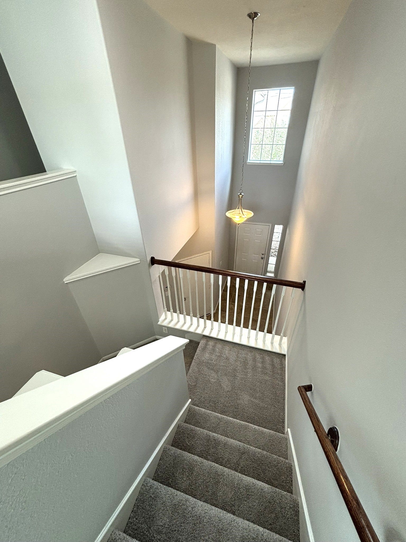 8415 Sunset Loch Drive, Spring, TX 77379 View from 2-story stairs to front door.