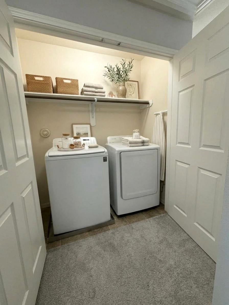 8415 Sunset Loch Drive, Spring, TX 77379 Washer and dryer in the laundry closet.