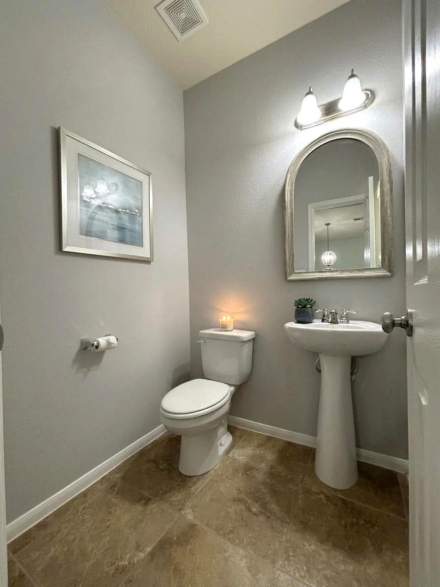 8415 Sunset Loch Drive, Spring, TX 77379 Half bathroom downstairs