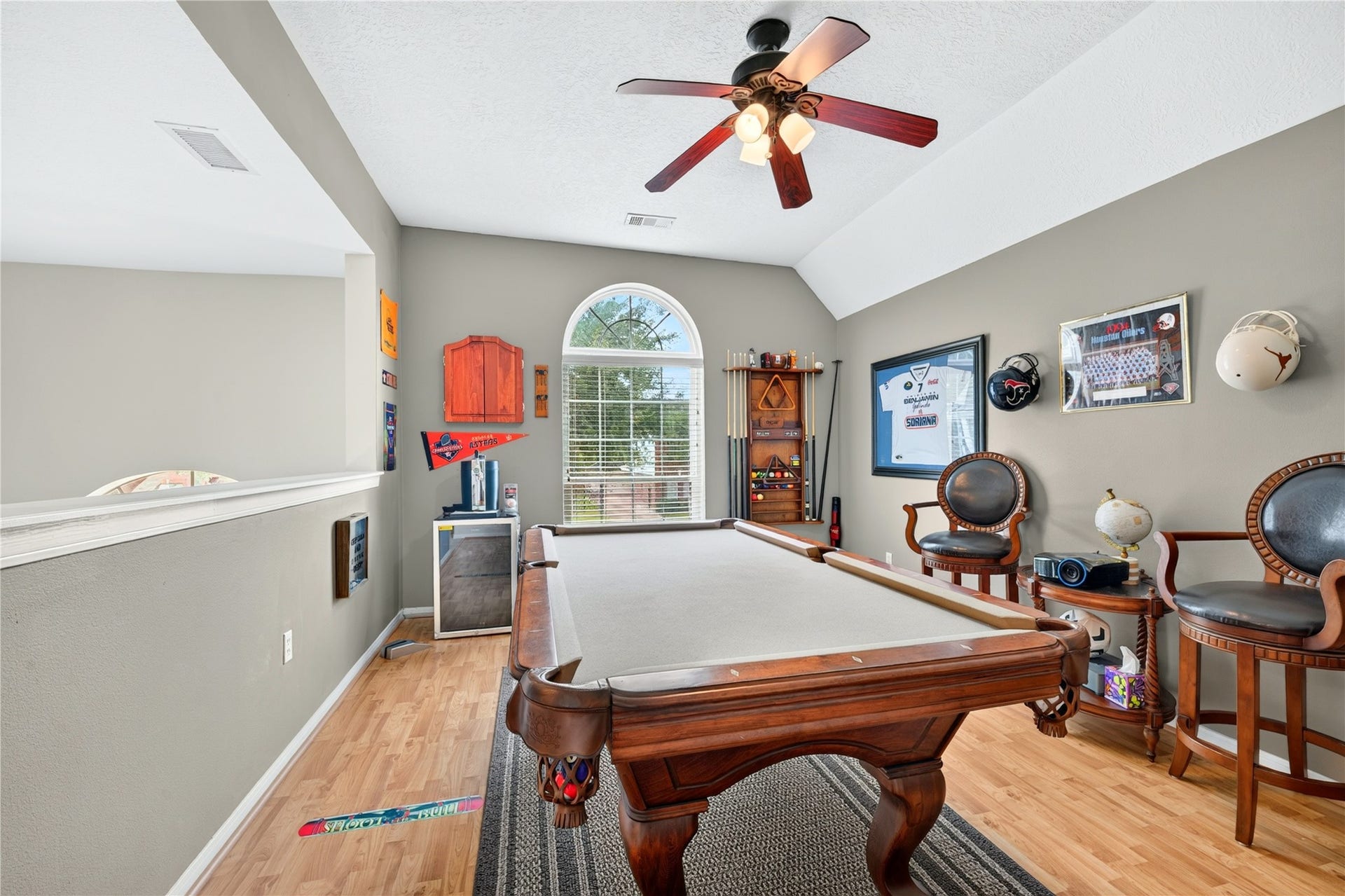 Spacious upstairs game room perfect for entertaining, recreation or a media space.