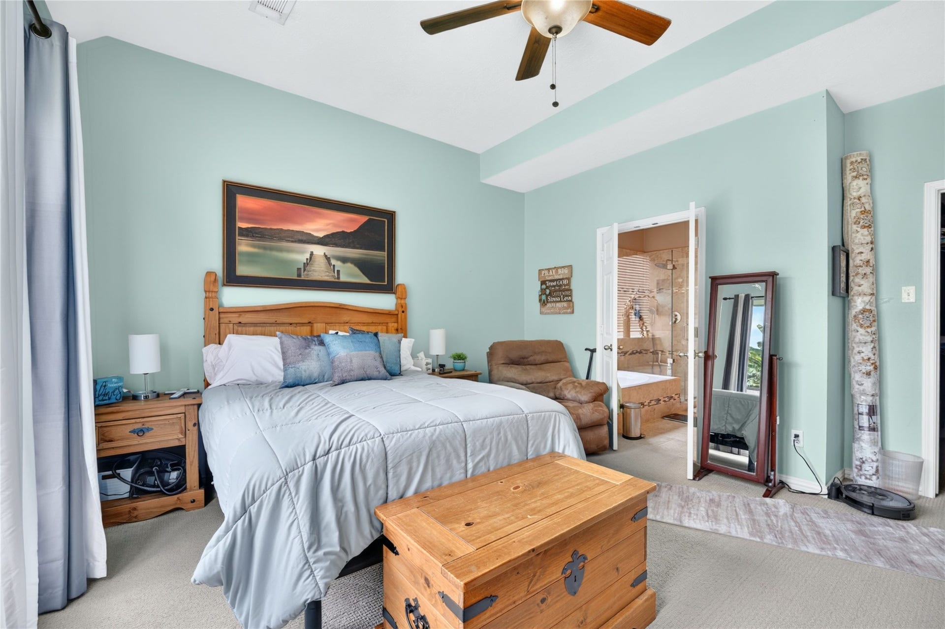 Generously sized primary suite with direct access to the private bathroom.