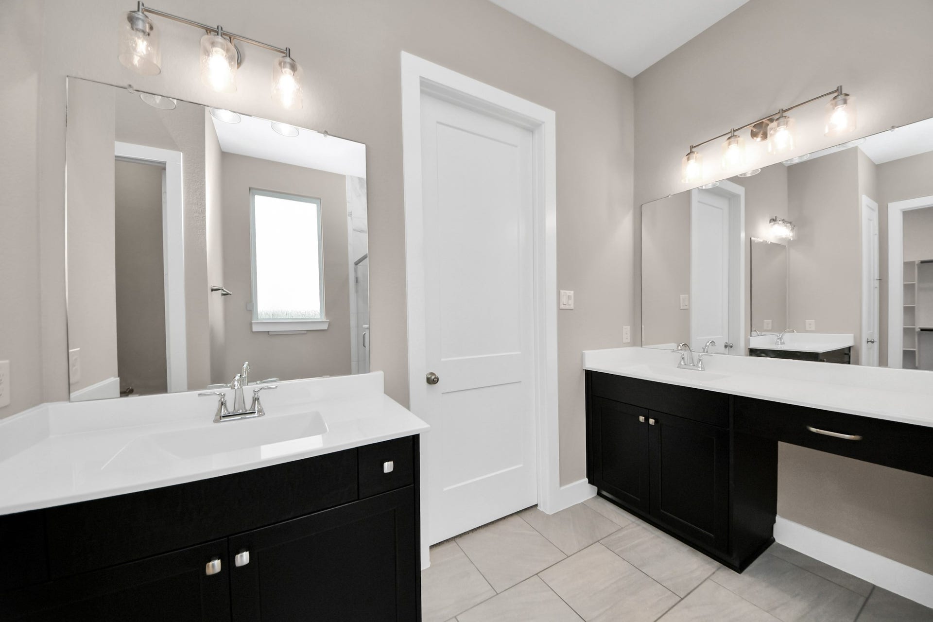 Primary bathroom double sinks and vanity