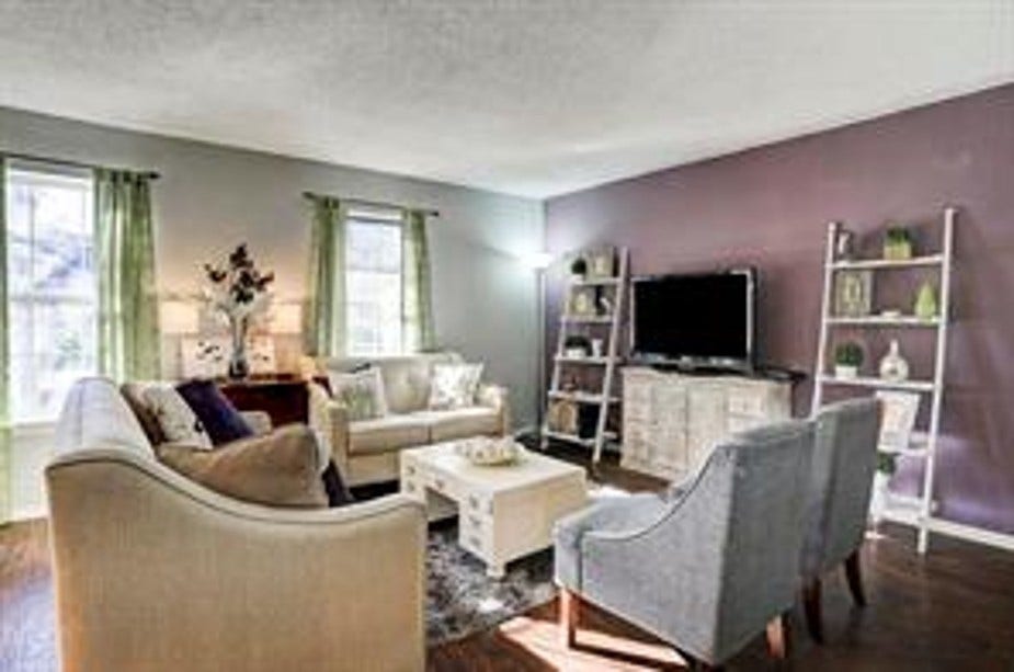 Living room can accommodate even the largest of tv's. Huge wall space for shelving, tv cabinet or extra storage pieces.