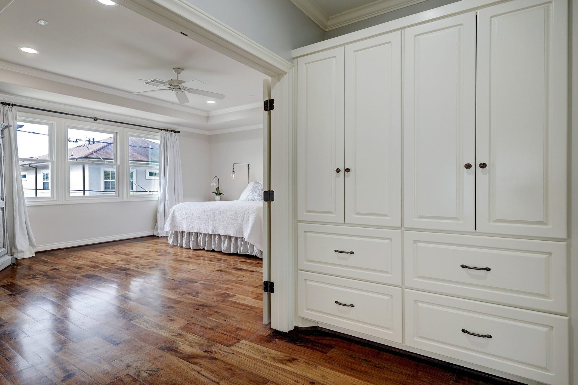 6004 Lake Street, Houston, TX 77005 Private entry to primary bedroom with large windows overlooking back yard and patio