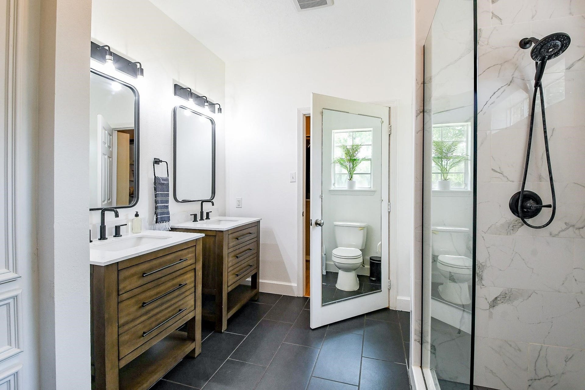 22035 Buescher Road, Tomball, TX 77377 Recently remodeled primary bath in the primary house
