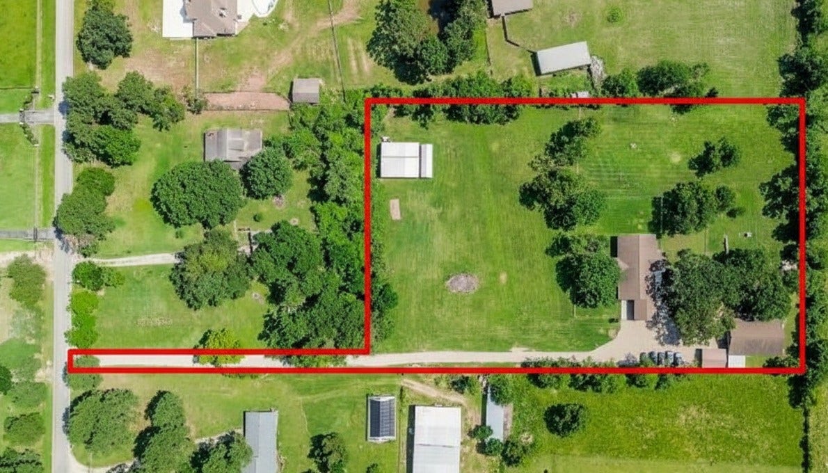 22035 Buescher Road, Tomball, TX 77377 Aerial view of property with private driveway