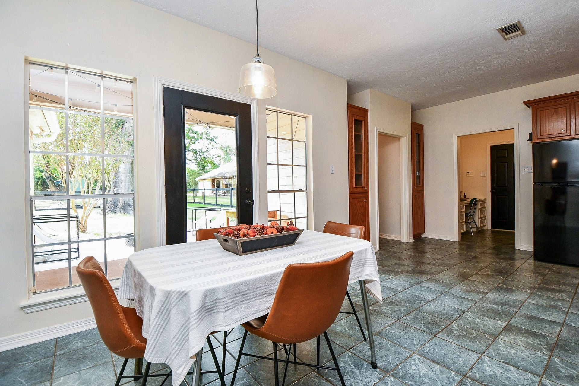 22035 Buescher Road, Tomball, TX 77377 Large, open dining area with access to the covered back porch in the primary house