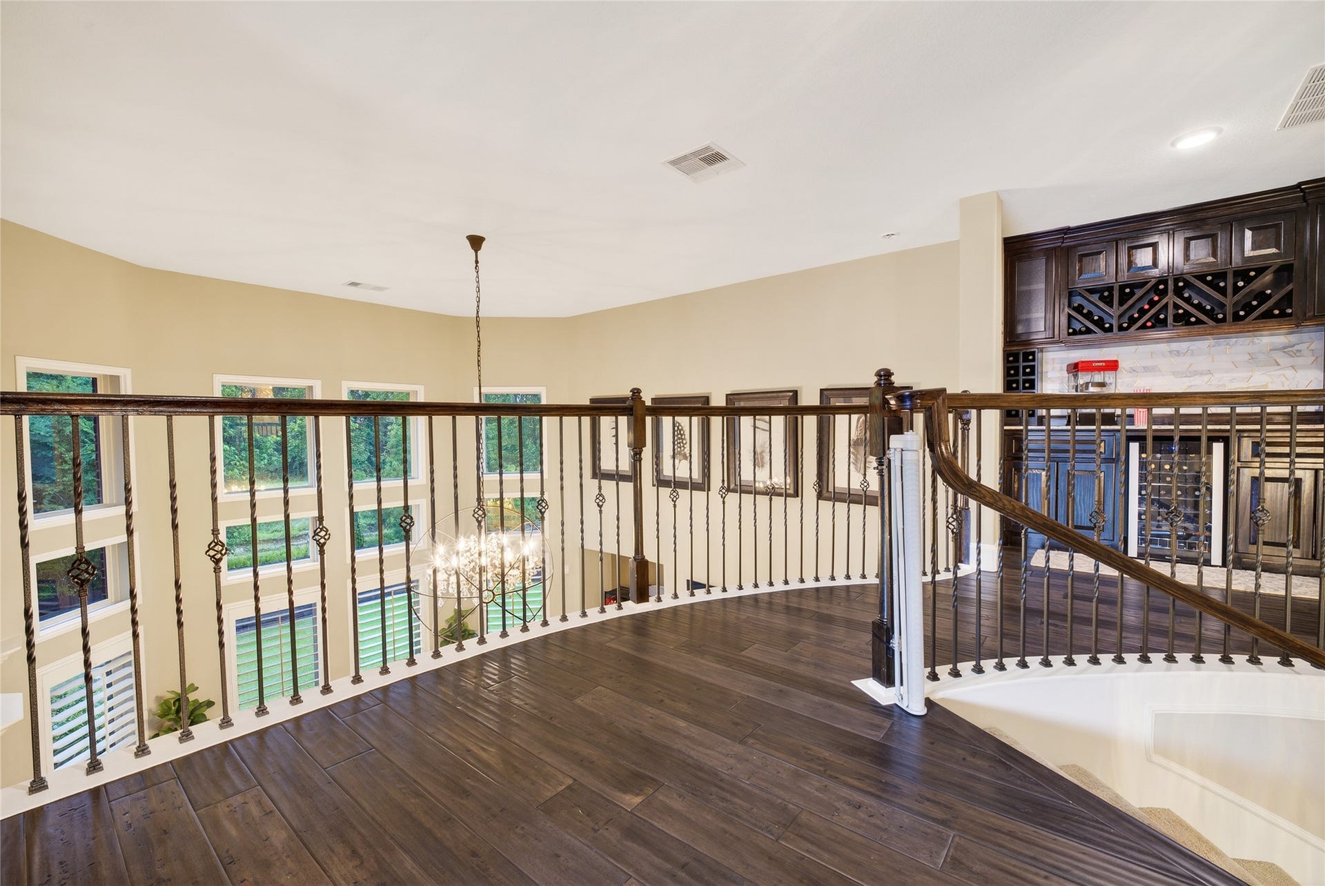 7907 Augusta Creek Court, Spring, TX 77389 Not a view gets missed in this home. At the top of the landing you can take in views of the back of the house and front entry.