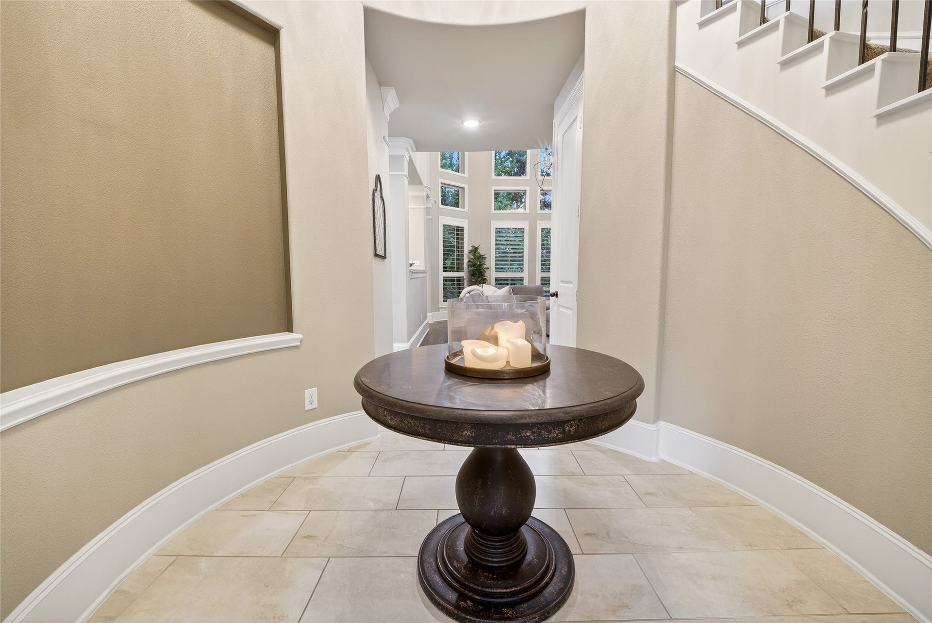 7907 Augusta Creek Court, Spring, TX 77389 Stunning entry leads you into the oversized kitchen and family room showcasing a wall of windows.