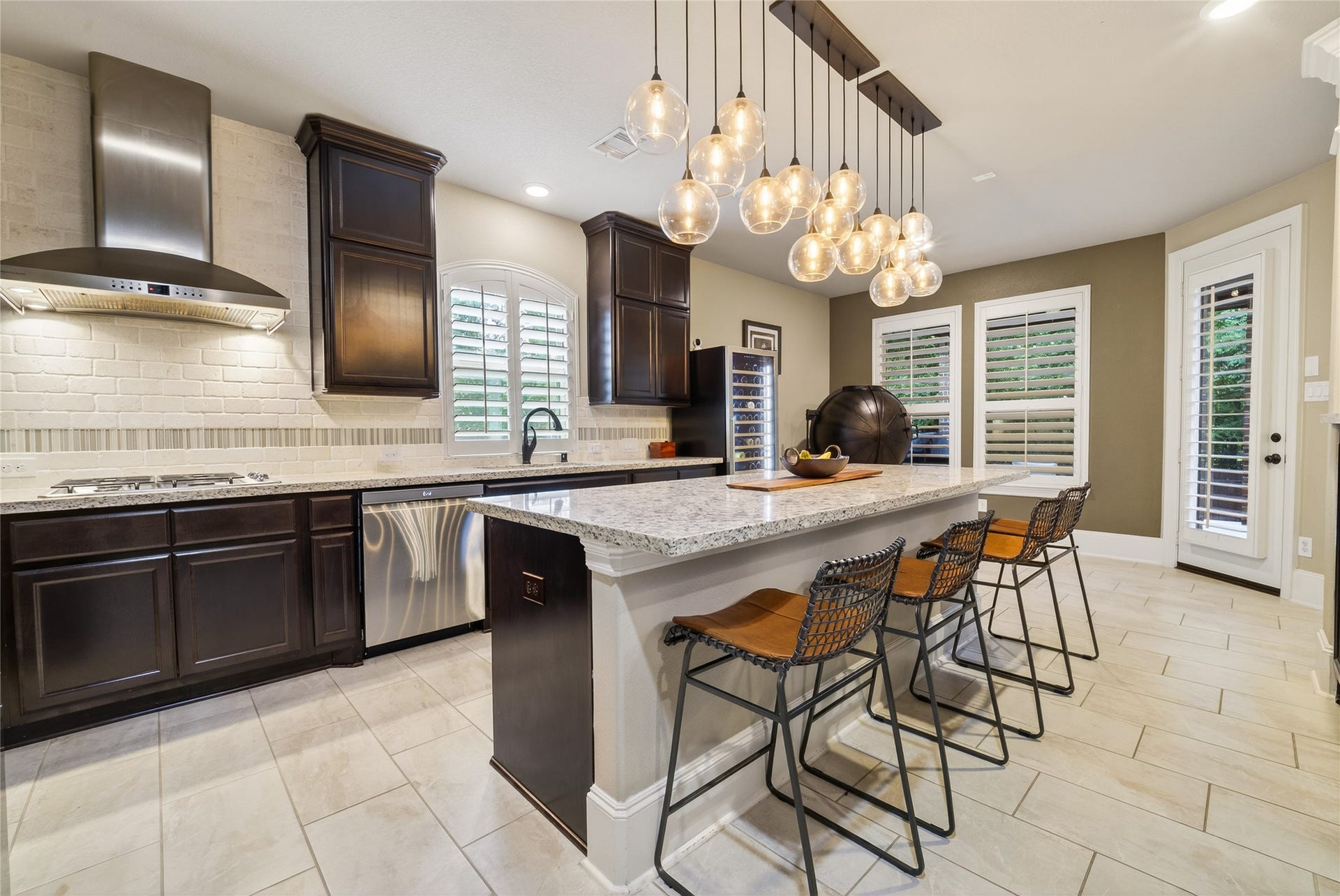 7907 Augusta Creek Court, Spring, TX 77389 Westin designs such a sleek and modern home and this kitchen does not disappoint!