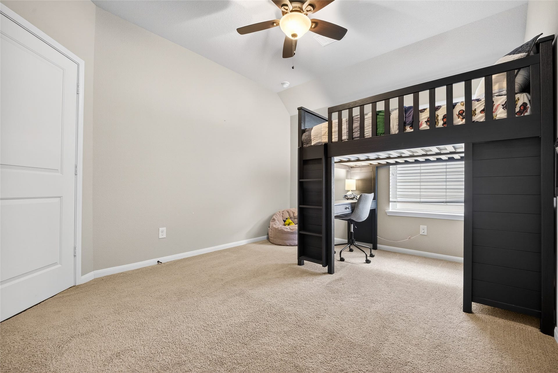 7907 Augusta Creek Court, Spring, TX 77389 Secondary upstairs bedroom with more than enough space for furniture.