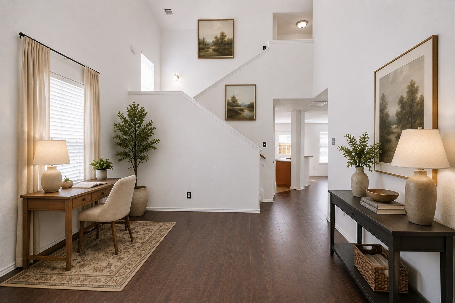 15435 Kaston Drive, Cypress, TX 77433 Soaring double-height ceilings elevate this open foyer, featuring rich wood-look flooring and a functional study nook tucked under the staircase. The bright space offers a seamless transition toward the main living areas and kitchen beyond. This photo has been virtually staged.