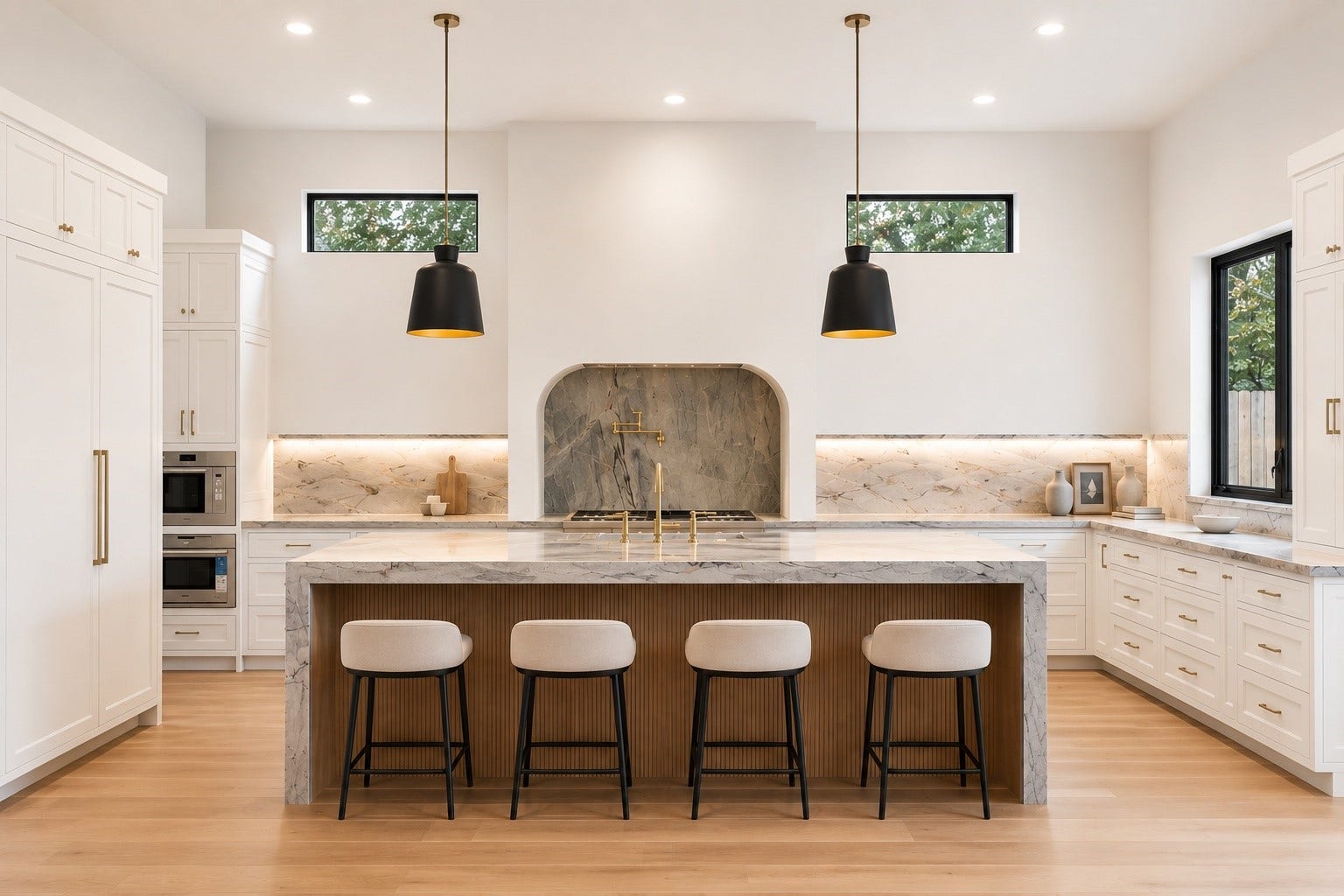 316 W 30th Street, Houston, TX 77018 Designed to impress, the kitchen pairs a dramatic waterfall island with fully inset, floor to ceiling cabinetry and a statement vent surround. High end natural stone throughout the home - quartzite, cristallo quartzite, limestone, onyx, marble, and soapstone - sets the tone here, where an upgraded Thermador package with a panel ready fridge/freezer combo elevates everyday function, alongside a seamless connection to the scullery. **Virtually staged**