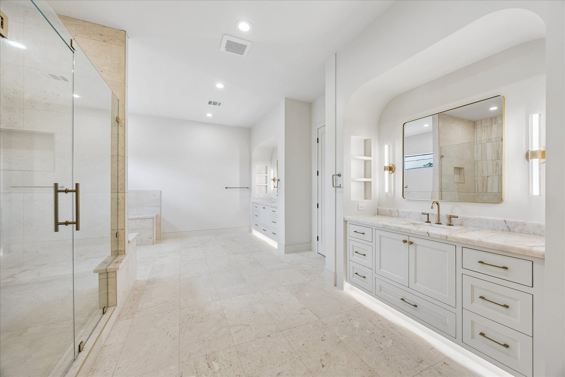 316 W 30th Street, Houston, TX 77018 Spa inspired luxury begins with an expansive walk in shower, and dual vanities finished with marble countertops and designer lighting. Thoughtful details throughout create a serene retreat designed for everyday comfort.