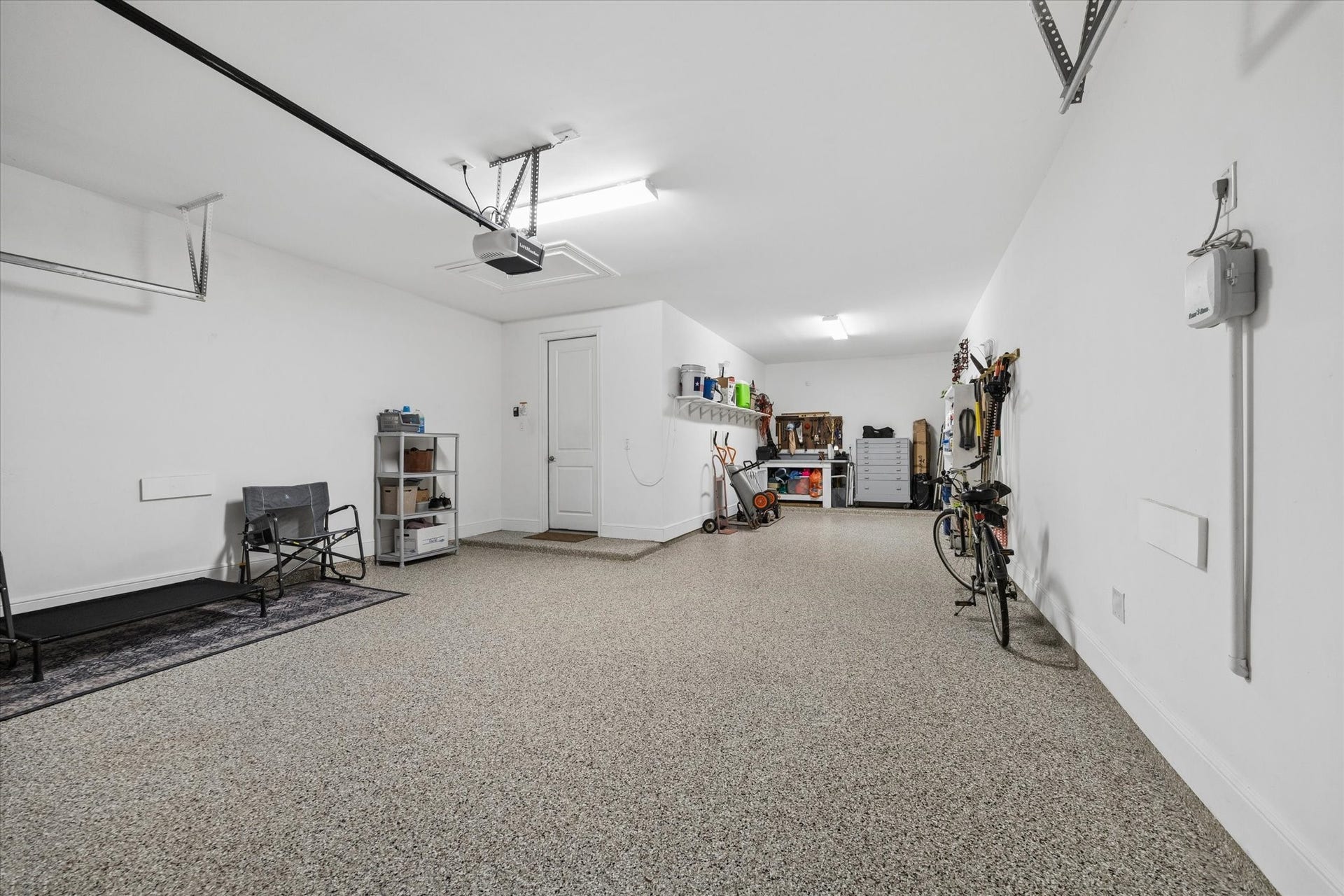 3 car garage with professionally applied epoxy