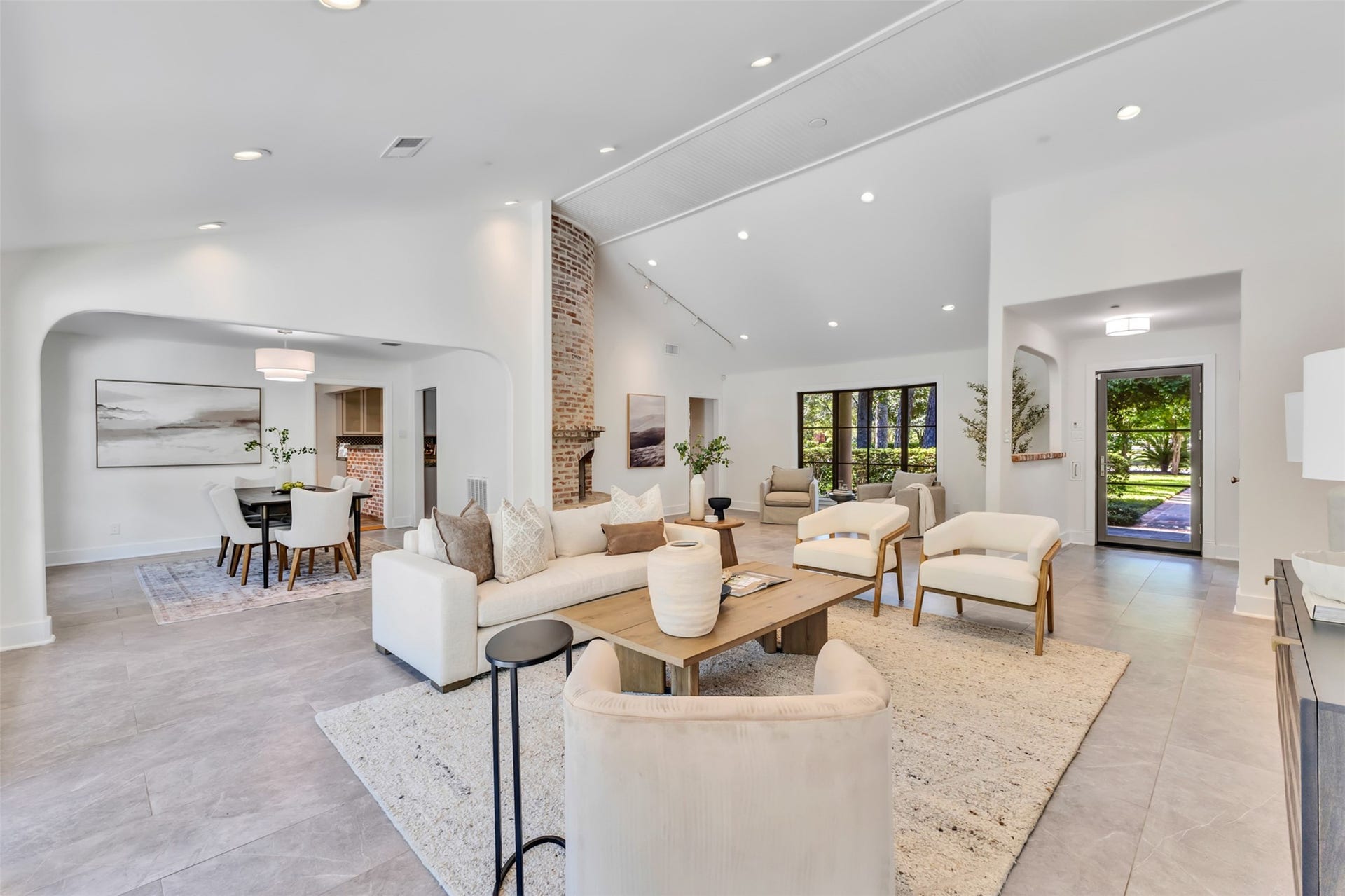 Flexible living/dining area with an open-concept flow that effortlessly connects your main gathering spaces to peaceful outdoor views.