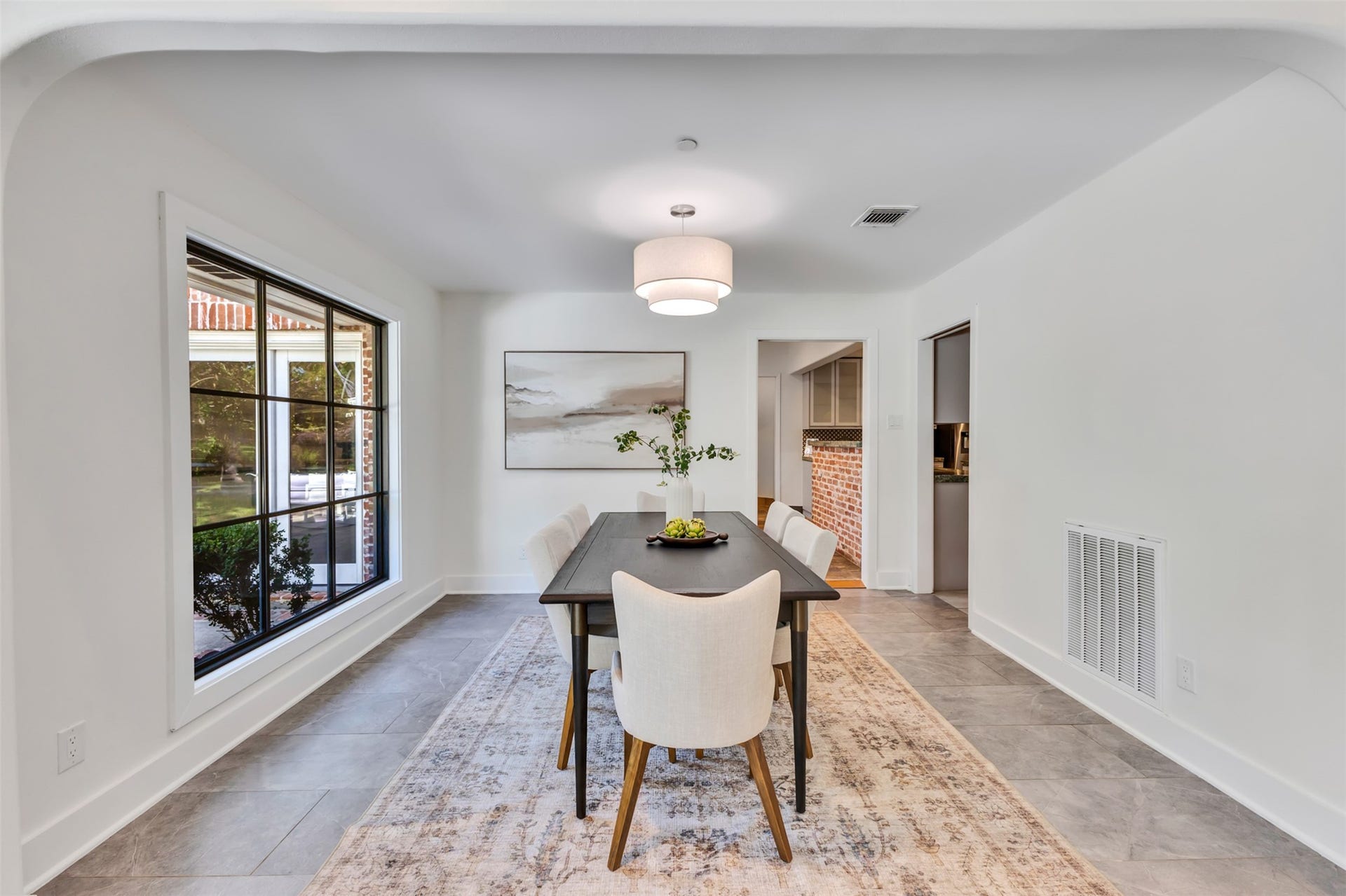 Intimate dining room featuring classic charm and ample space for a full-sized table to gather the whole family.