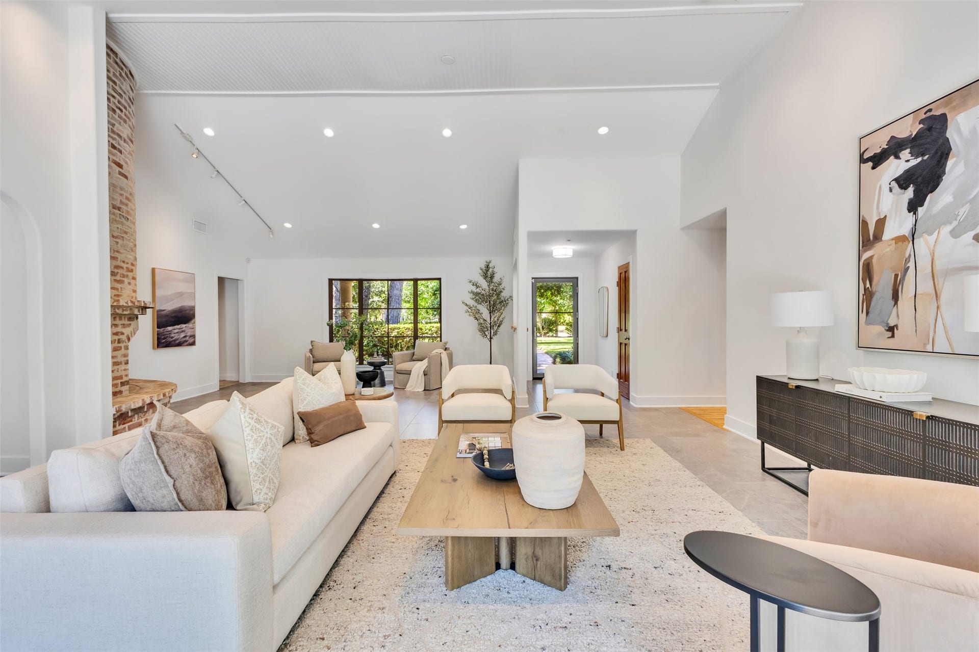 Upgraded with brand-new windows (2025) and a new front entry door (2025), this bright open-concept space offers seamless indoor-outdoor views from every single window.