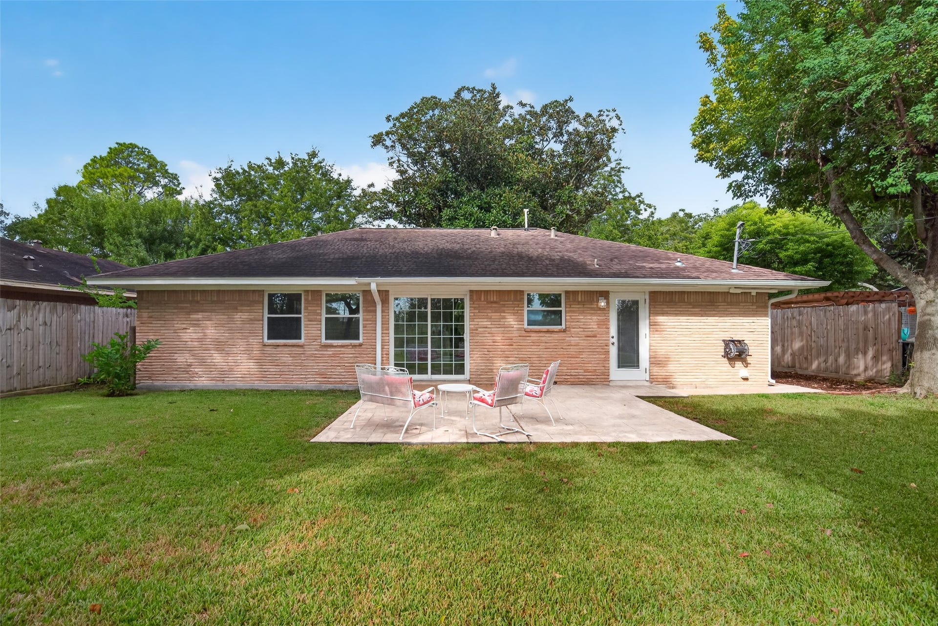 11227 Greenwillow Street, Houston, TX 77035 Perfect patio for entertaining or relaxing! Glass door has built-in blinds.