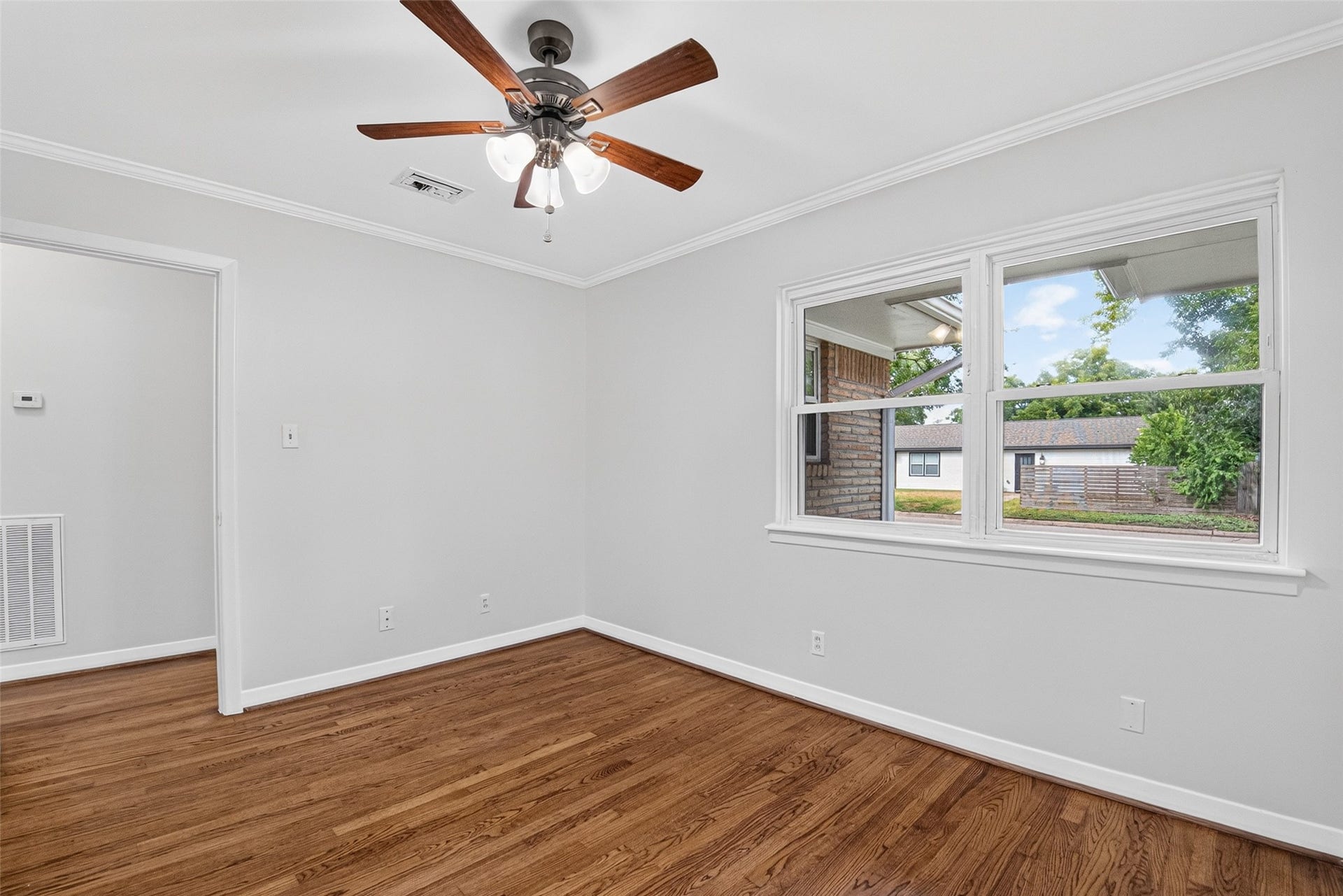 11227 Greenwillow Street, Houston, TX 77035 Secondary bedroom has crown molding too.