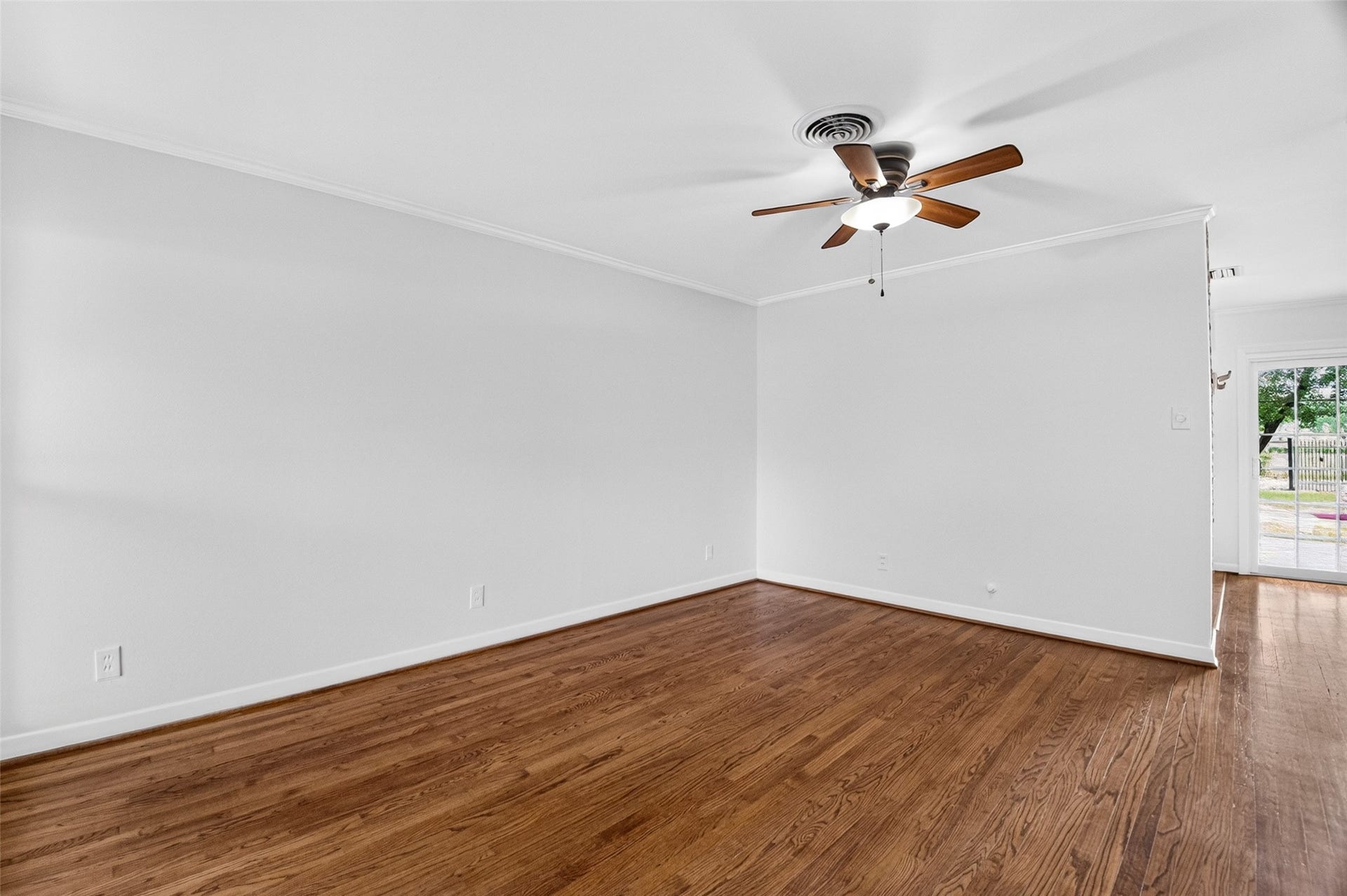11227 Greenwillow Street, Houston, TX 77035 Living room flows into dining area.