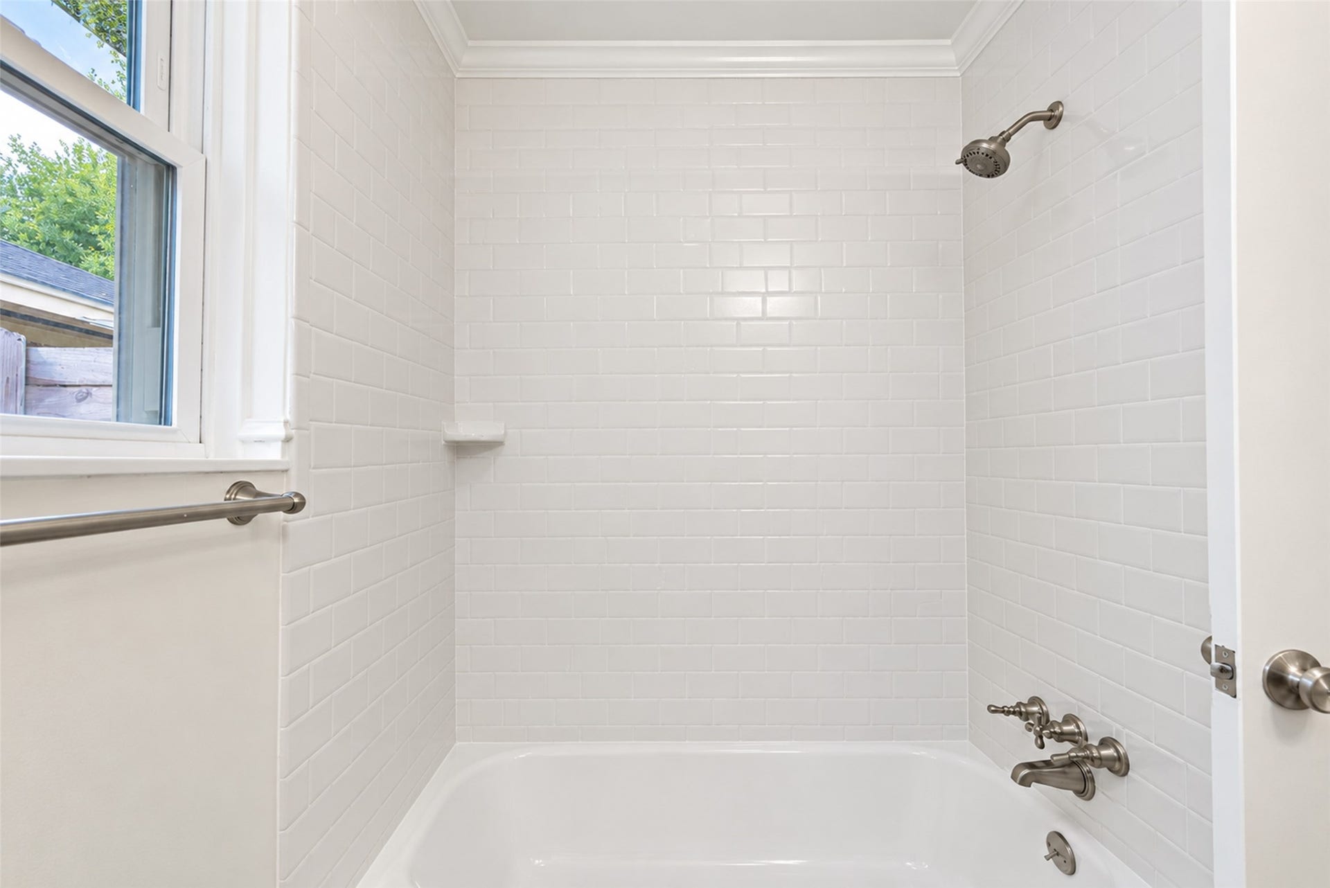 11227 Greenwillow Street, Houston, TX 77035 Bath tub with shower head in hall bathroom