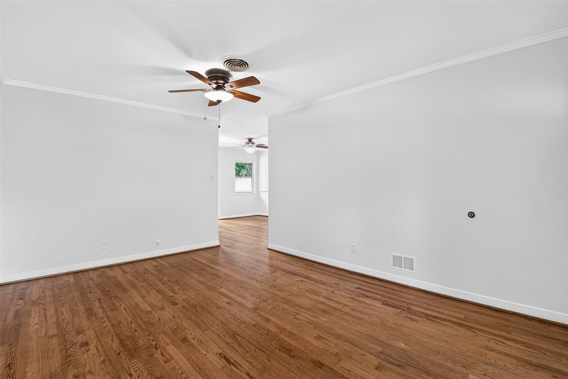 11227 Greenwillow Street, Houston, TX 77035 Another view of living area leading to dining area. Gorgeous refinished real hardwood floors.