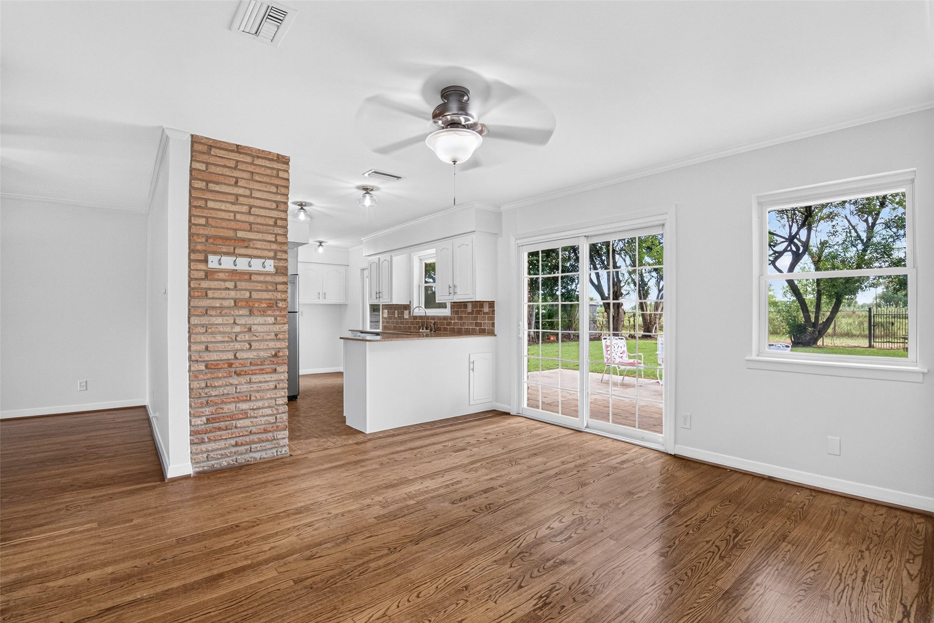 11227 Greenwillow Street, Houston, TX 77035 Great view of backyard through the double-paned glass door to patio!