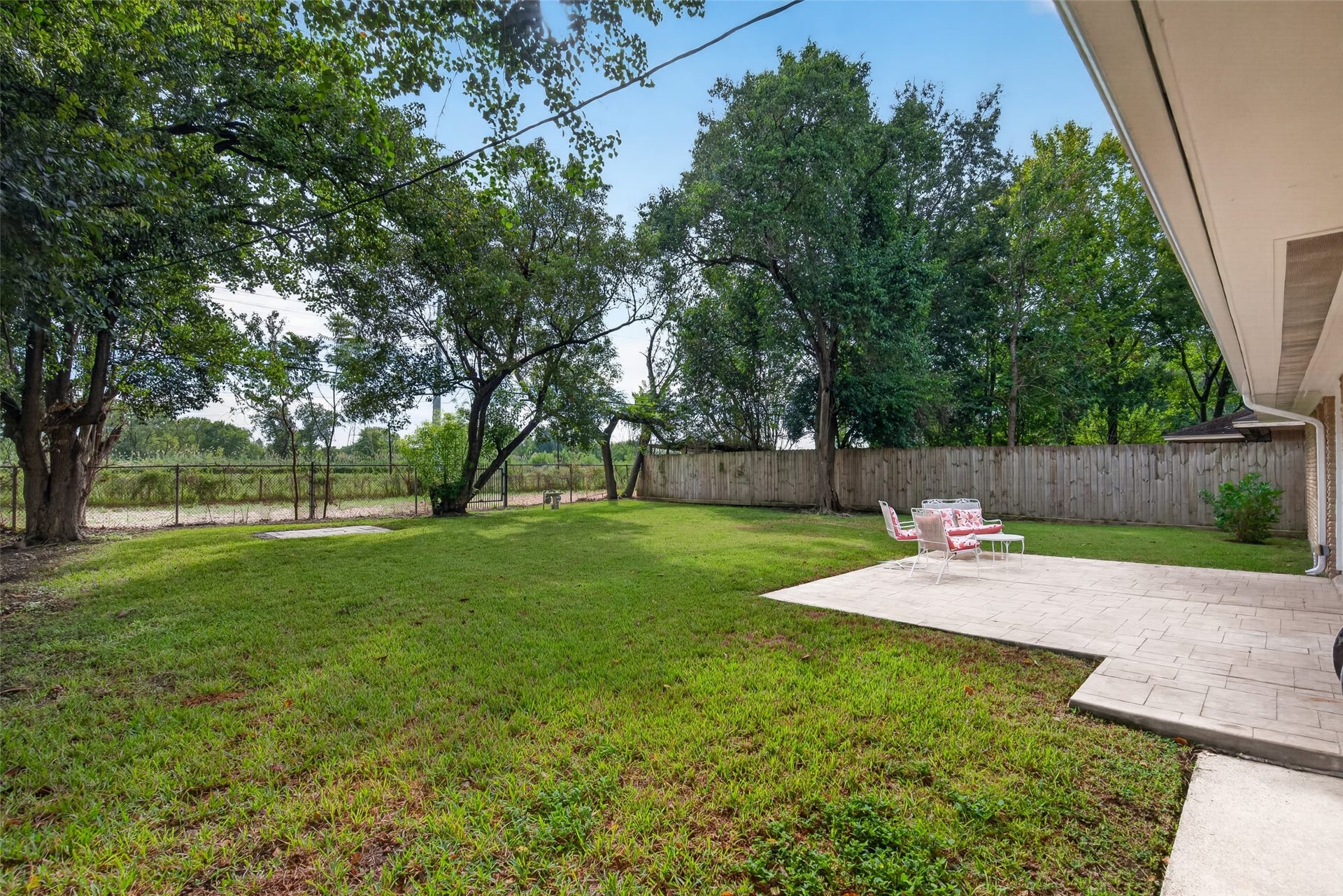 11227 Greenwillow Street, Houston, TX 77035 Another view of back patio and yard looking out to easement area.