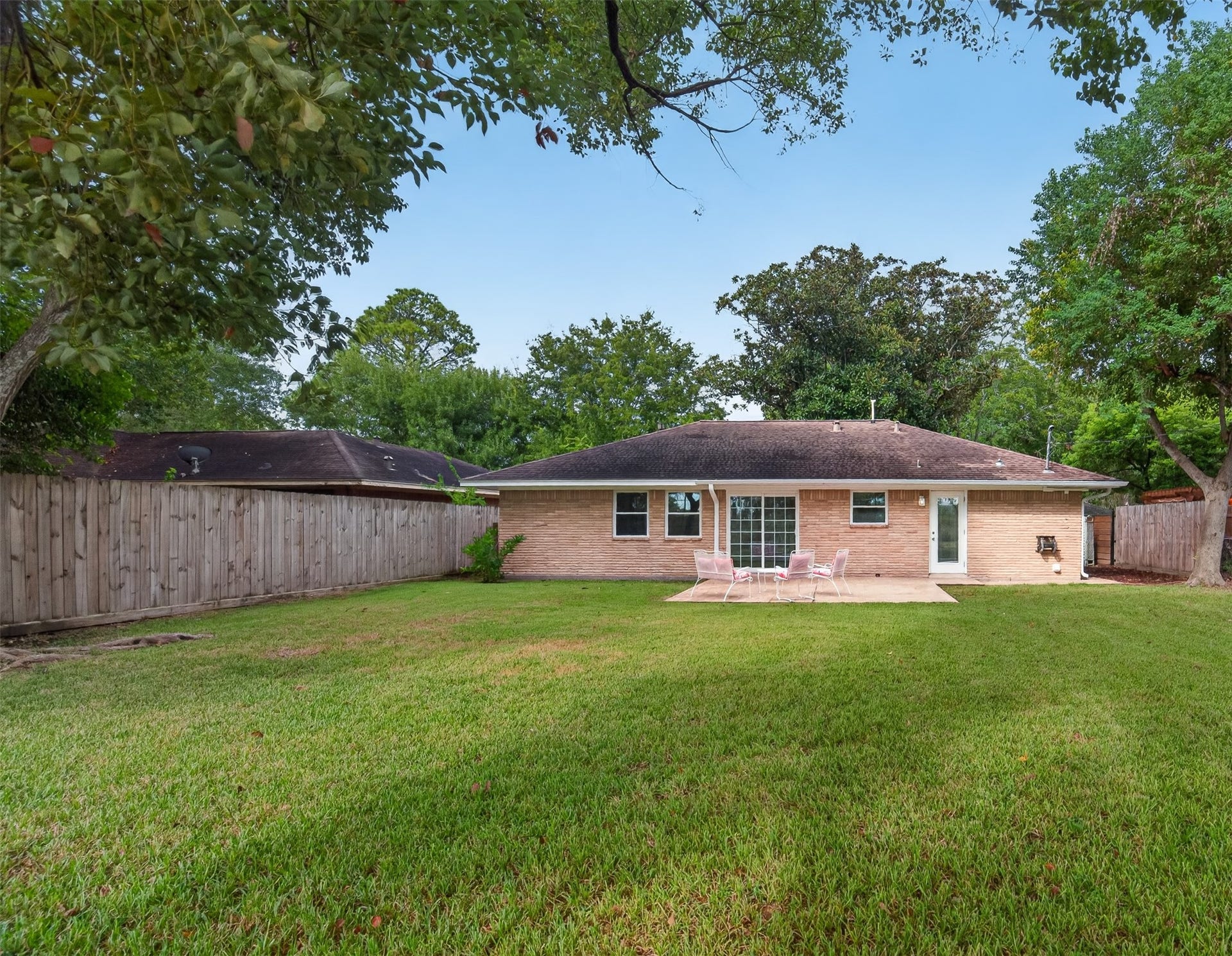 11227 Greenwillow Street, Houston, TX 77035 Rear elevation of house. Brick on all 4-sides. Gutters!