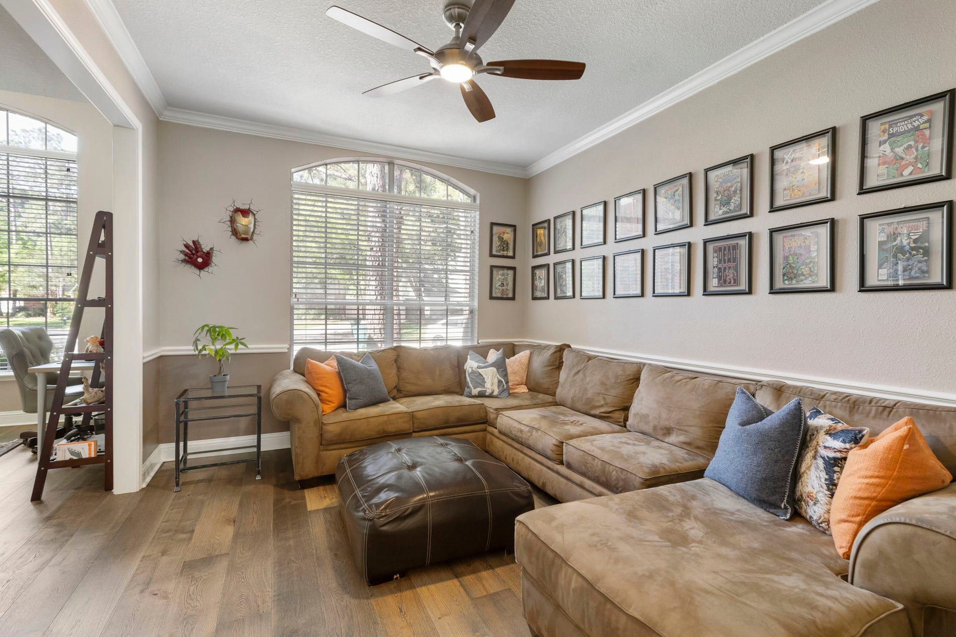 98 W Night Heron Place, The Woodlands, TX 77382 The den offers a comfortable secondary living space thats perfect for movie nights, a playroom, or relaxing with family and friends. This could also be used as a formal dining room. There is direct access to the kitchen.