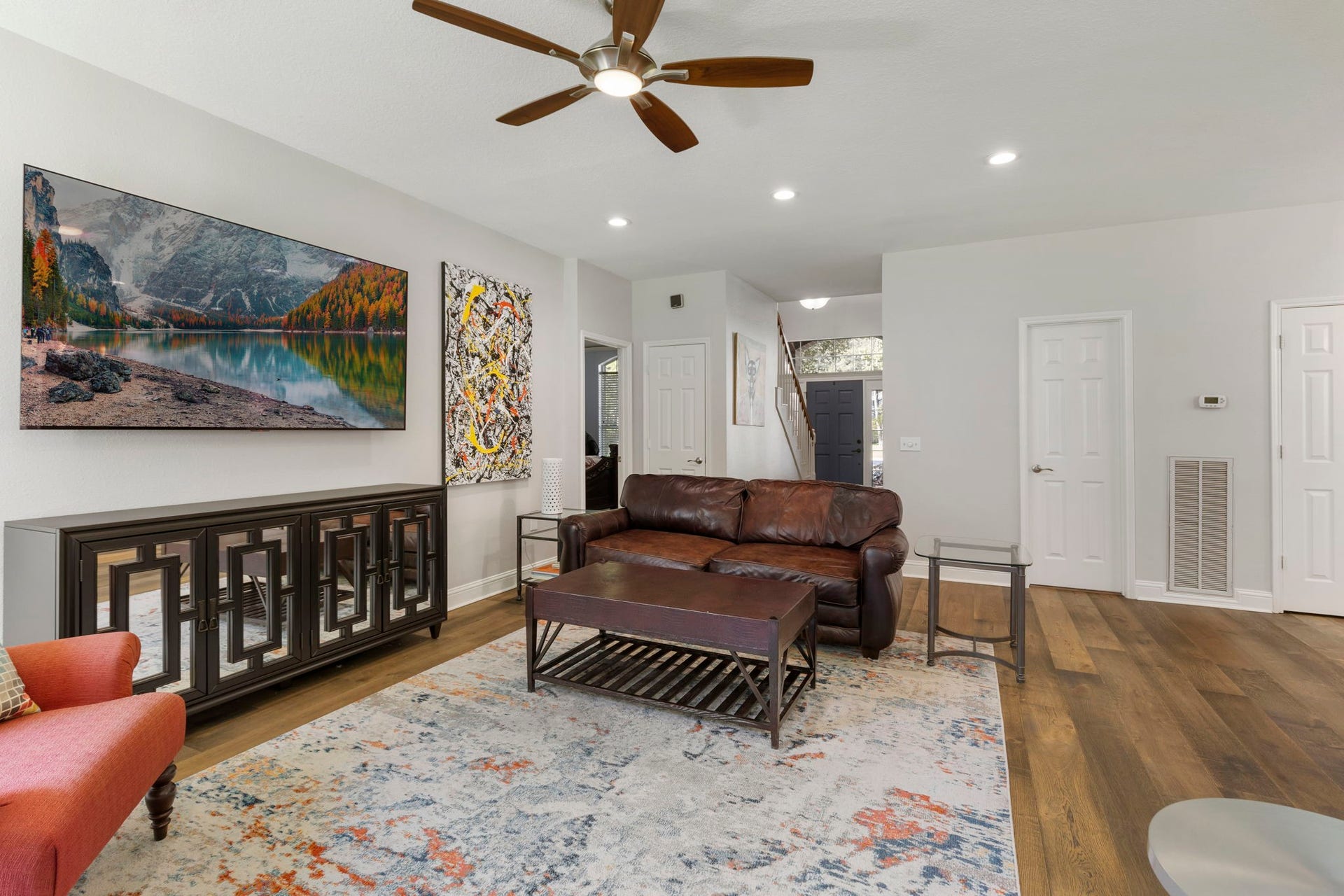98 W Night Heron Place, The Woodlands, TX 77382 Neutral finishes and durable hardwood flooring throughout the first floor create a clean, cohesive look that complements any style.