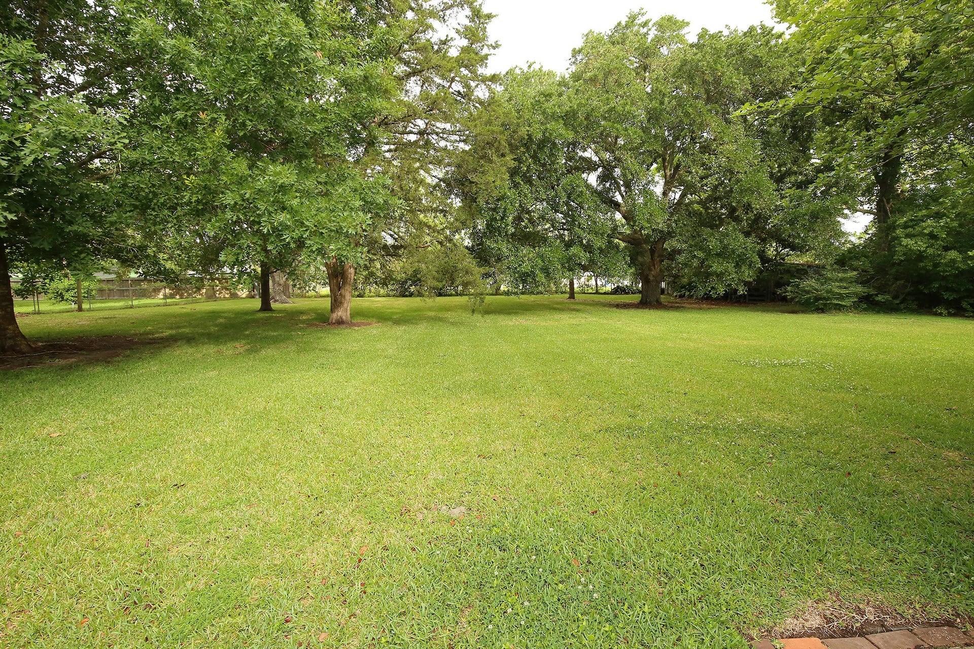 3804 Shady Lane, Santa Fe, TX 77517 Expansive backyard with ample space for a pool and endless outdoor possibilities.