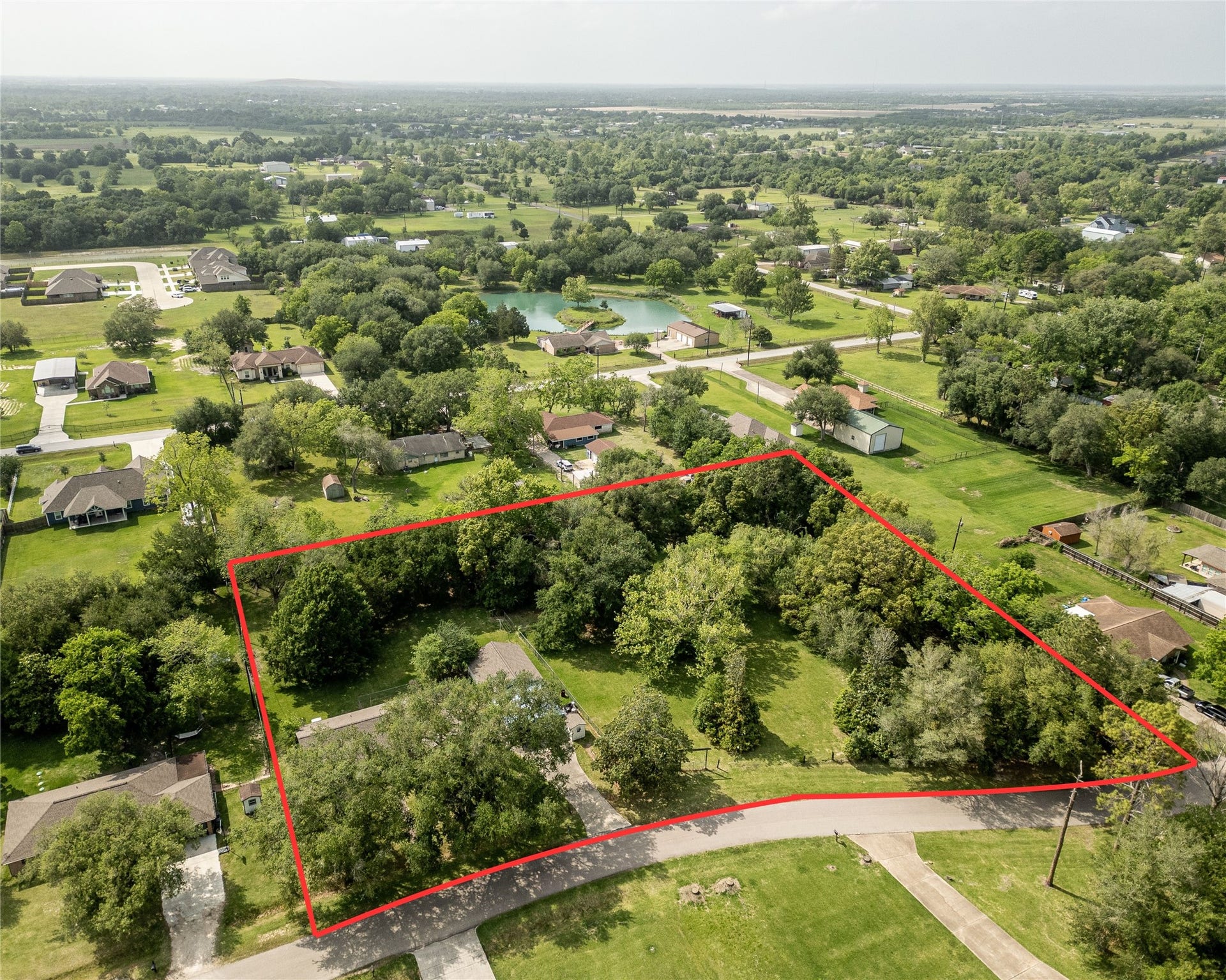 3804 Shady Lane, Santa Fe, TX 77517 Drone Shot of the whole 1.8 Acres with the House, Garage, Barn, Chicken Coop and Greenhouse!