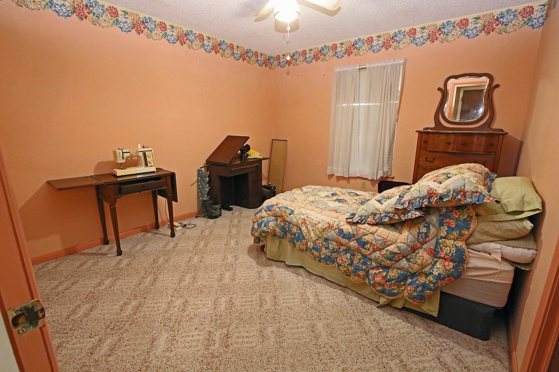 3804 Shady Lane, Santa Fe, TX 77517 Cozy secondary bedroom with plush carpeting and ample natural light, perfect for guests or a home office.