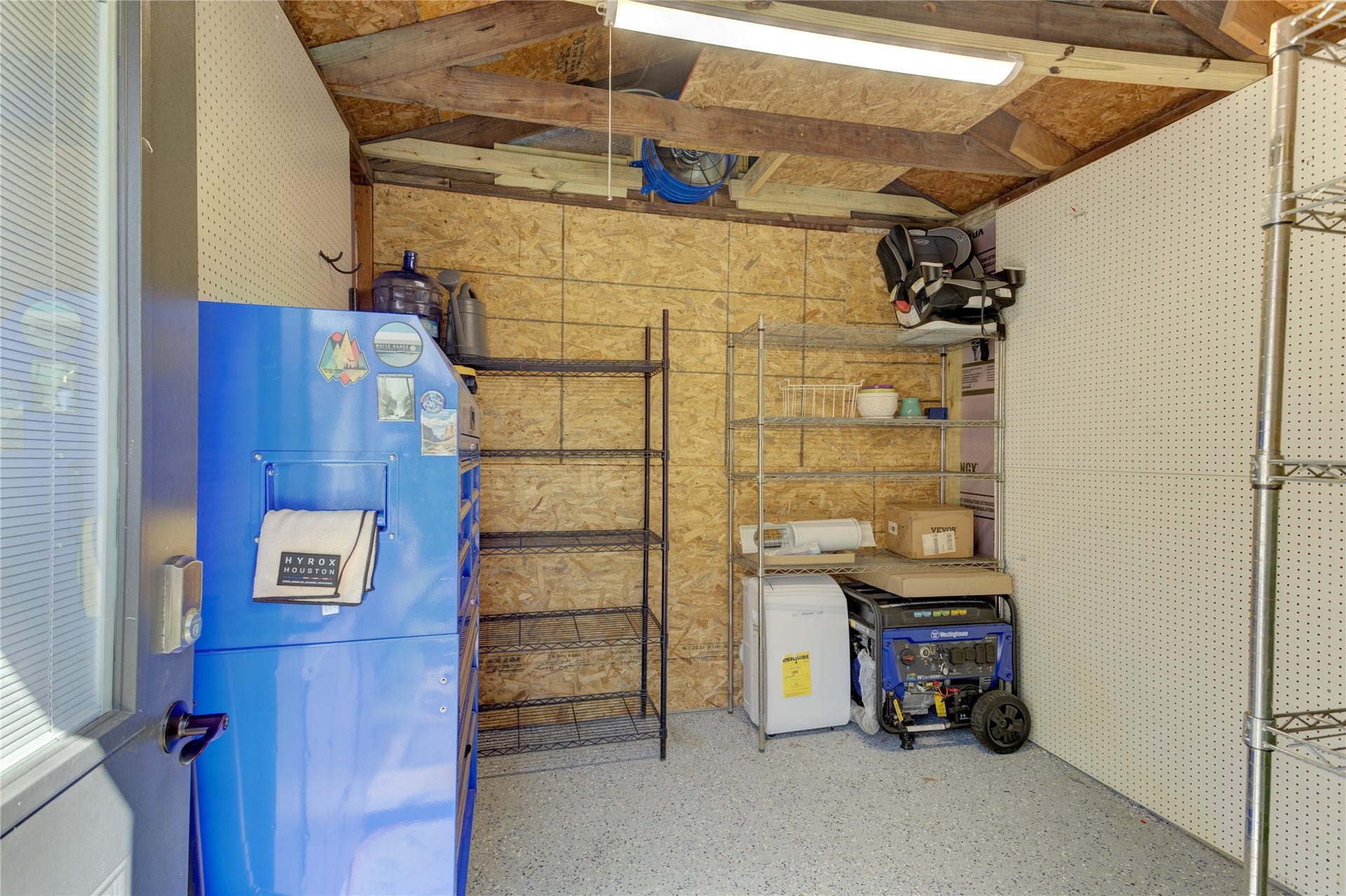 3007 Topham Circle, Houston, TX 77018 For additional convenience, a spacious and organized shed offers a work space or additional storage.