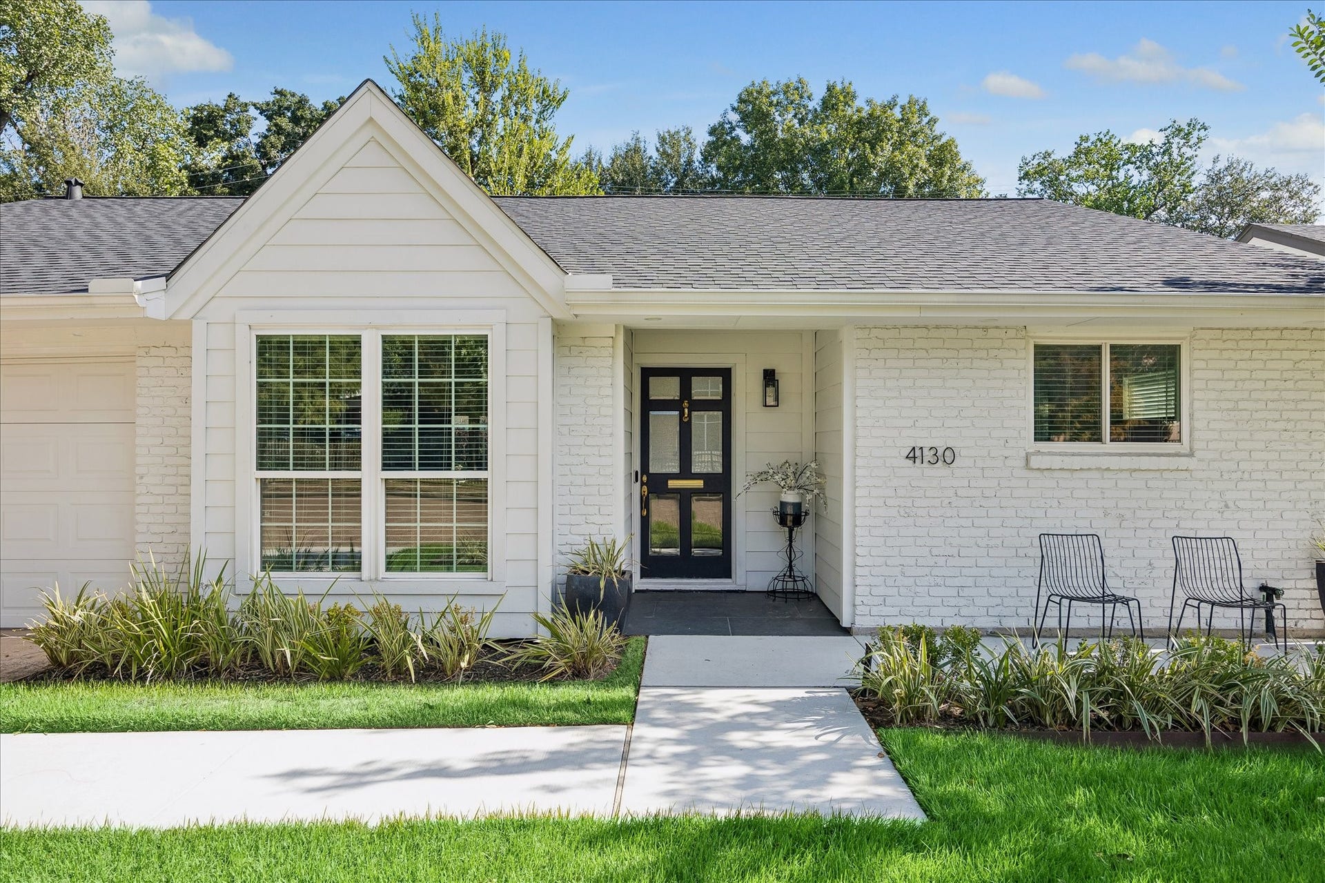 4130 Costa Rica Road, Houston, TX 77092 A charming front gable and recessed entry add architectural interest to the home's timeless exterior.