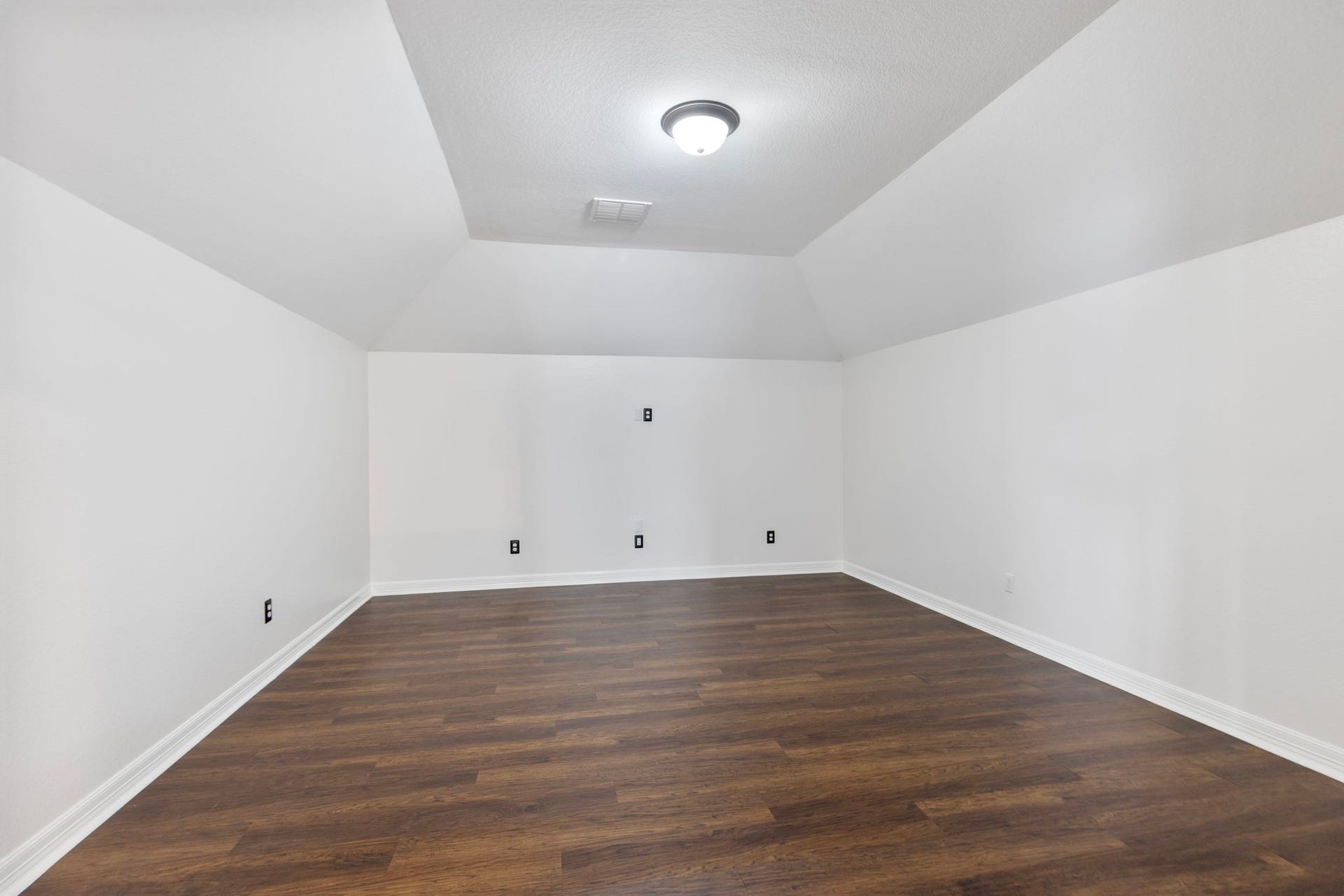 Large media room ready for your family to enjoy movies.