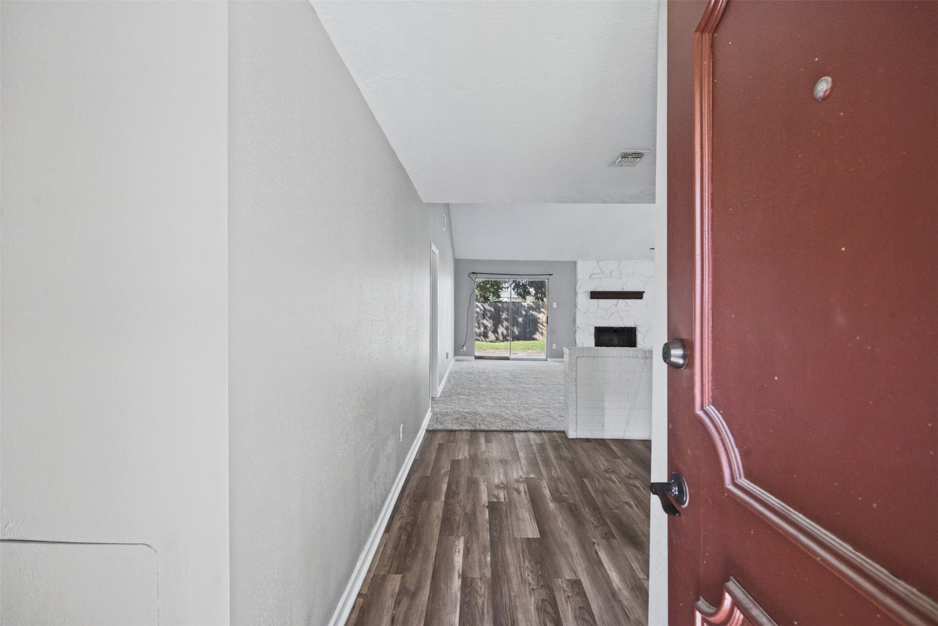 1323 Castle Glen Drive, Houston, TX 77015 Step inside and discover a welcoming entry that leads toward the spacious living area, where a striking fireplace and views of the backyard set the stage for comfortable everyday living.