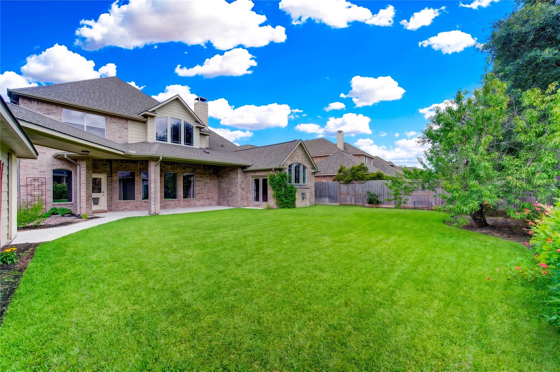 18614 Thomas Survey Drive, Cypress, TX 77433 Enjoy Outdoor Living in This Spacious Backyard