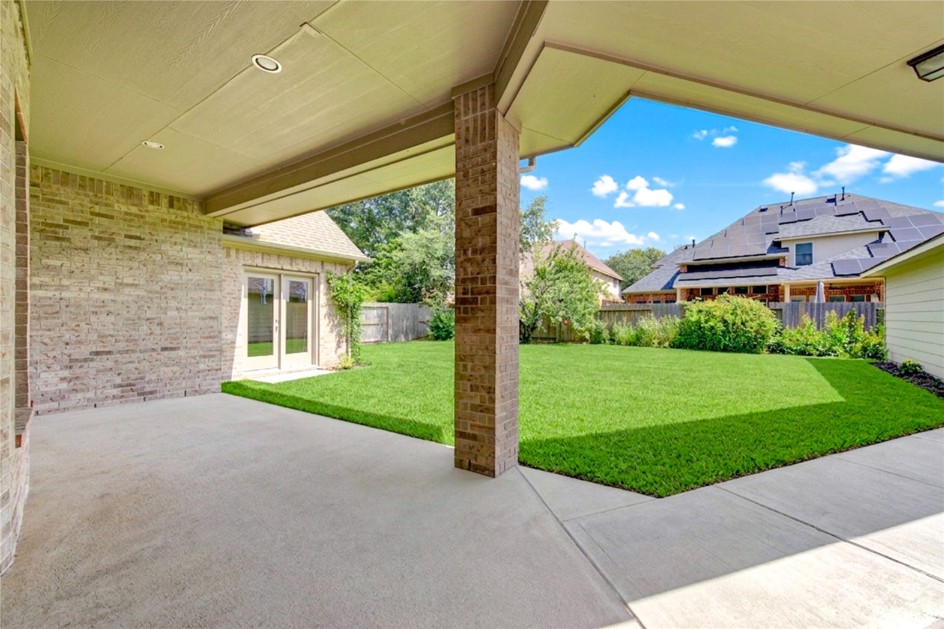 18614 Thomas Survey Drive, Cypress, TX 77433 Backyard view with ample space for entertaining.