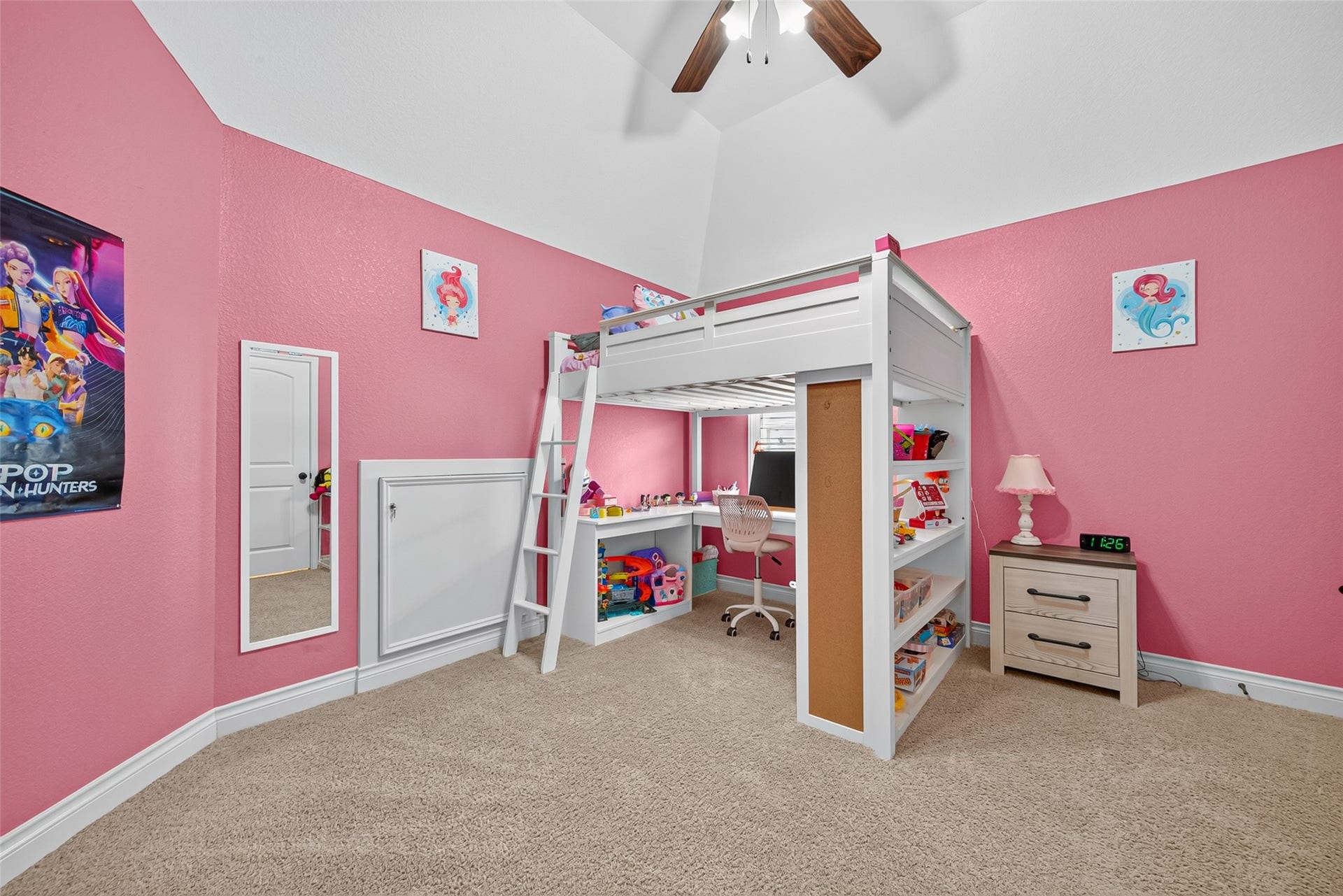 6710 Aqua Falls, Missouri City, TX 77459 Children's bedroom with vibrant pink walls, perfect for a playful and organized environment.