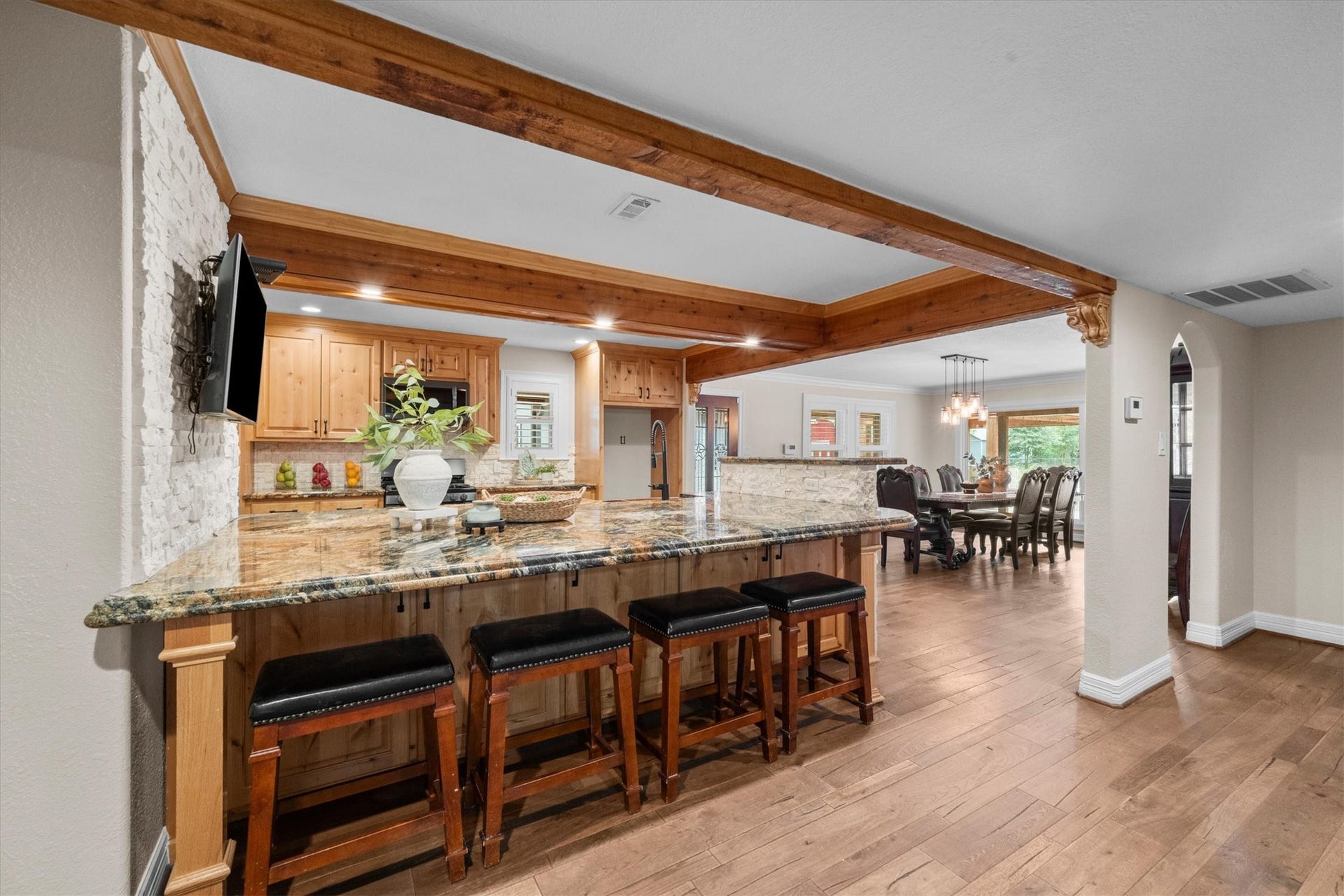 7119 Poole Road, Spring, TX 77379 The massive kitchen island is a natural gathering spot, offering generous space for meal prep, serving party favorites, and sharing conversation. Its easy to imagine everyone gathering here while memories are made.