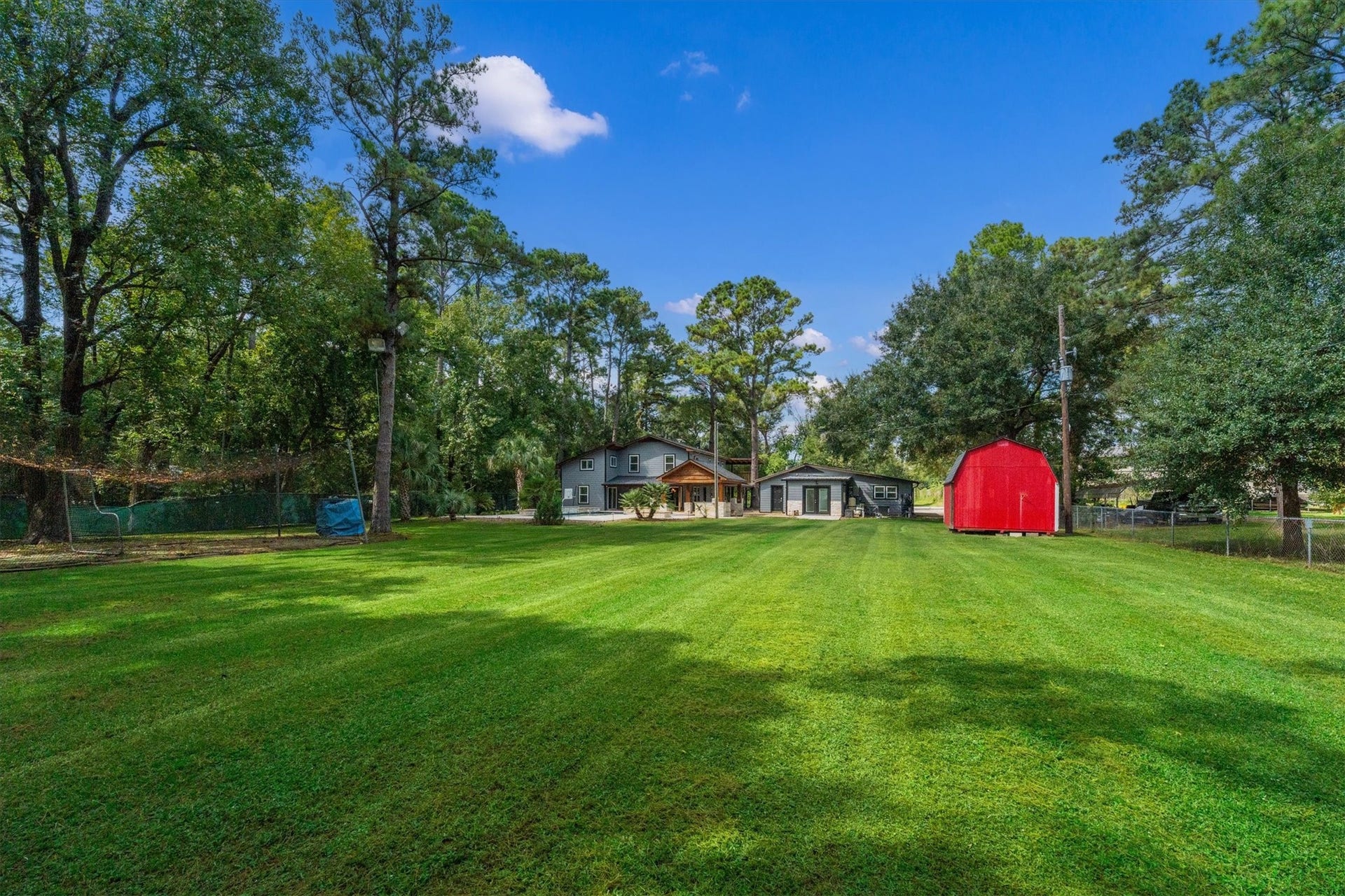 7119 Poole Road, Spring, TX 77379 Looking back toward the home from the rear of the property, you can appreciate the expansive yard and all its possibilities.