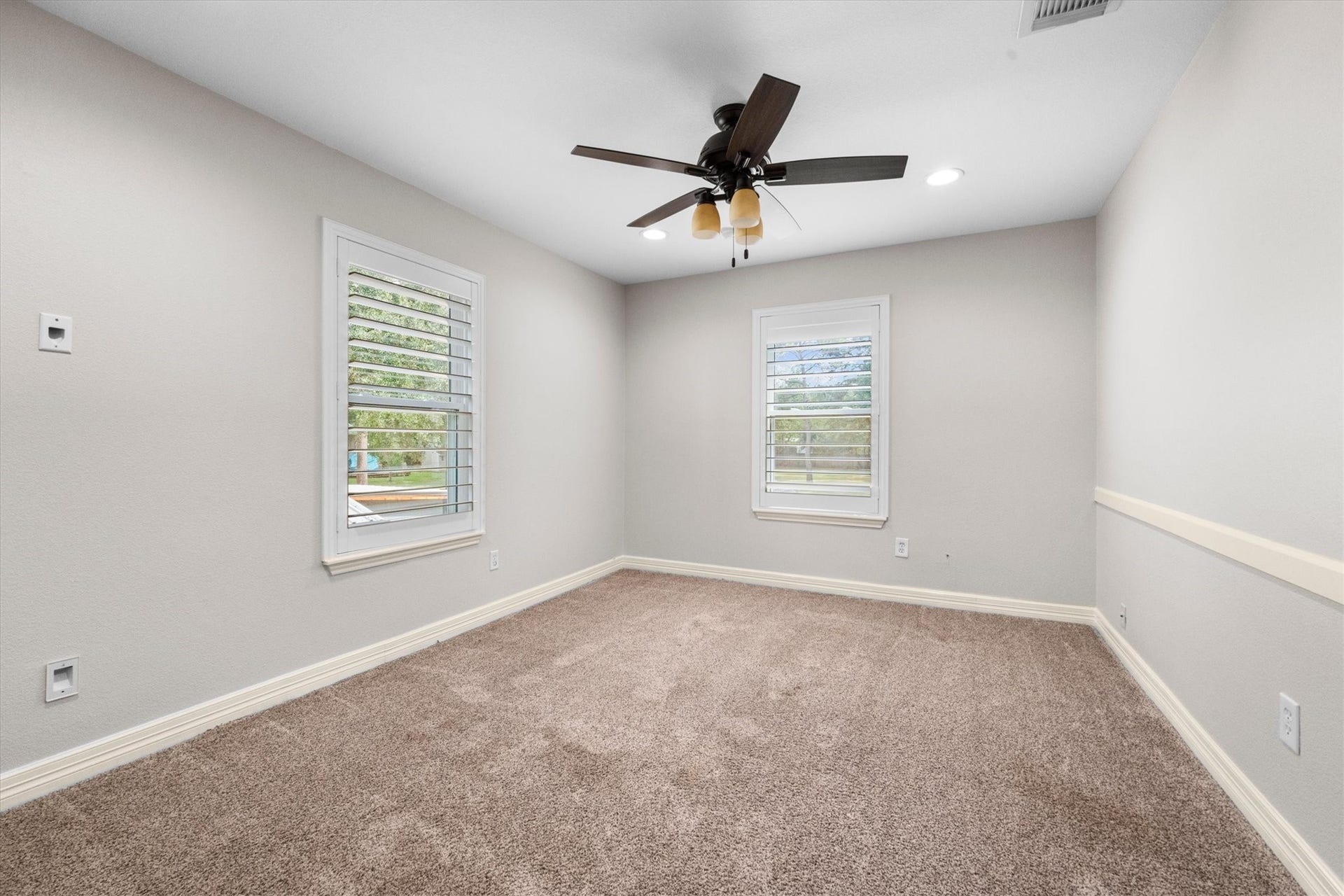 7119 Poole Road, Spring, TX 77379 Secondary Bedroom 2 is spacious with plenty of natural light.
